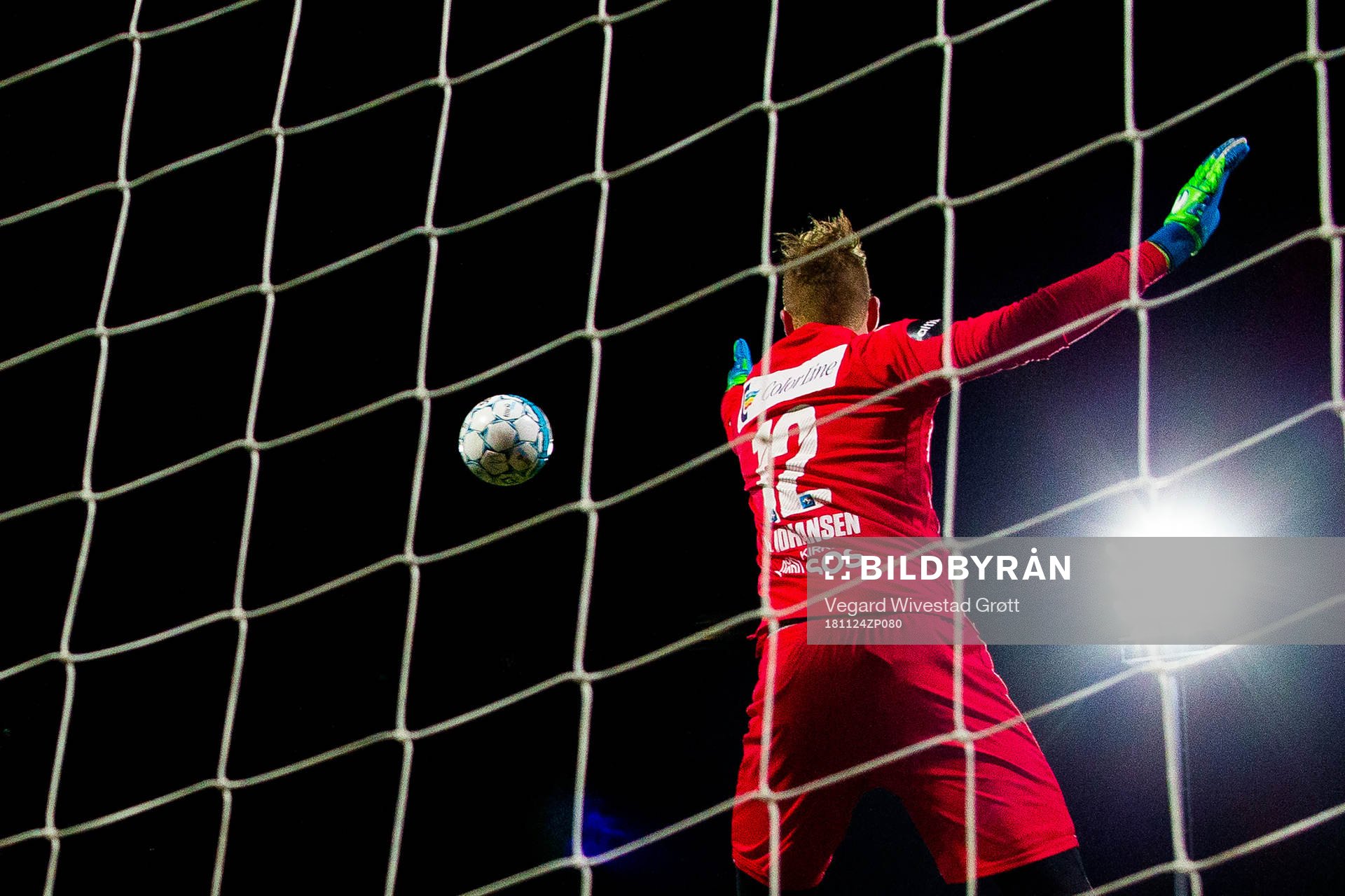 Goalkeeper Eirik Johansen of Sandefjord saves an attempt