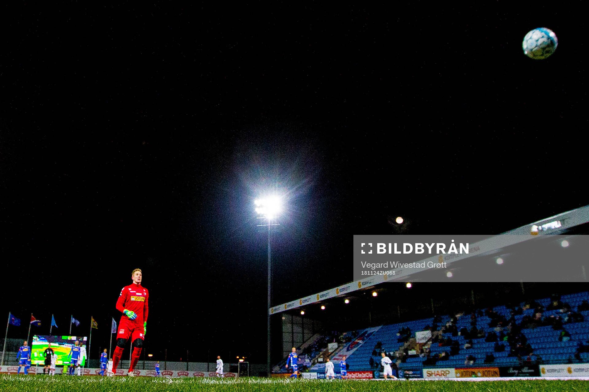 Goalkeeper Eirik Johansen of Sandefjord sees the ball hit