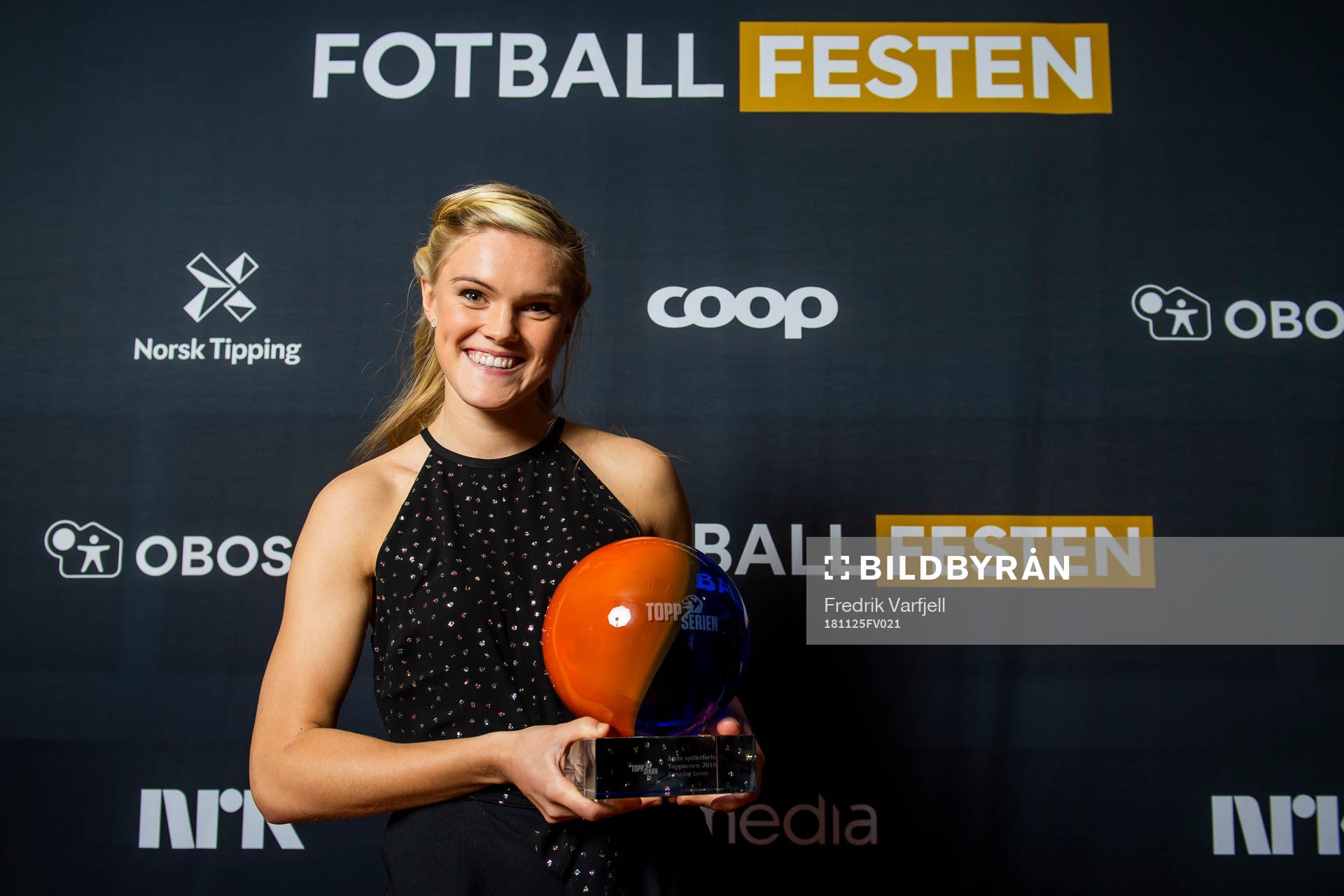 Kristine Leine of Røa poses for a portrait with the award