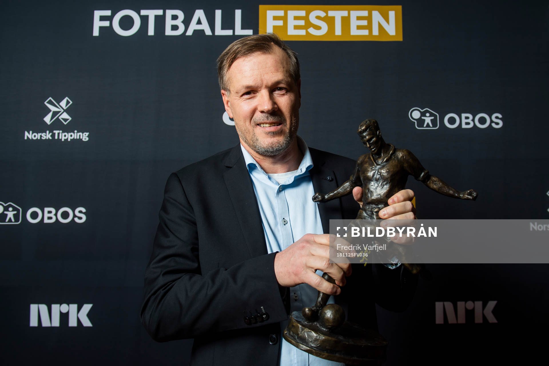 Kjetil Rekdal of Start poses for a portrait with the award