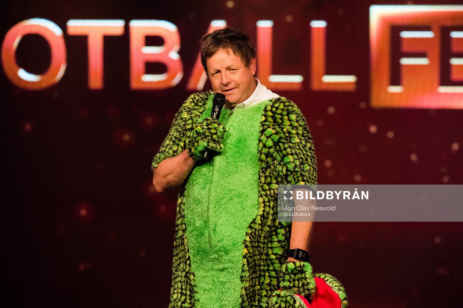 Bjarne Berntsen, coach of Viking, in a dinosaur costume