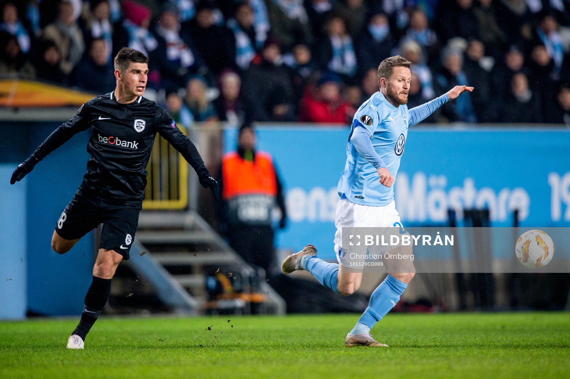 Ruslan Malinovskyi of Genk and Lasse Nielsen of Malmö FF during the Europa league match between Malmö FF and Genk on November 29, 2018 in Malmö.