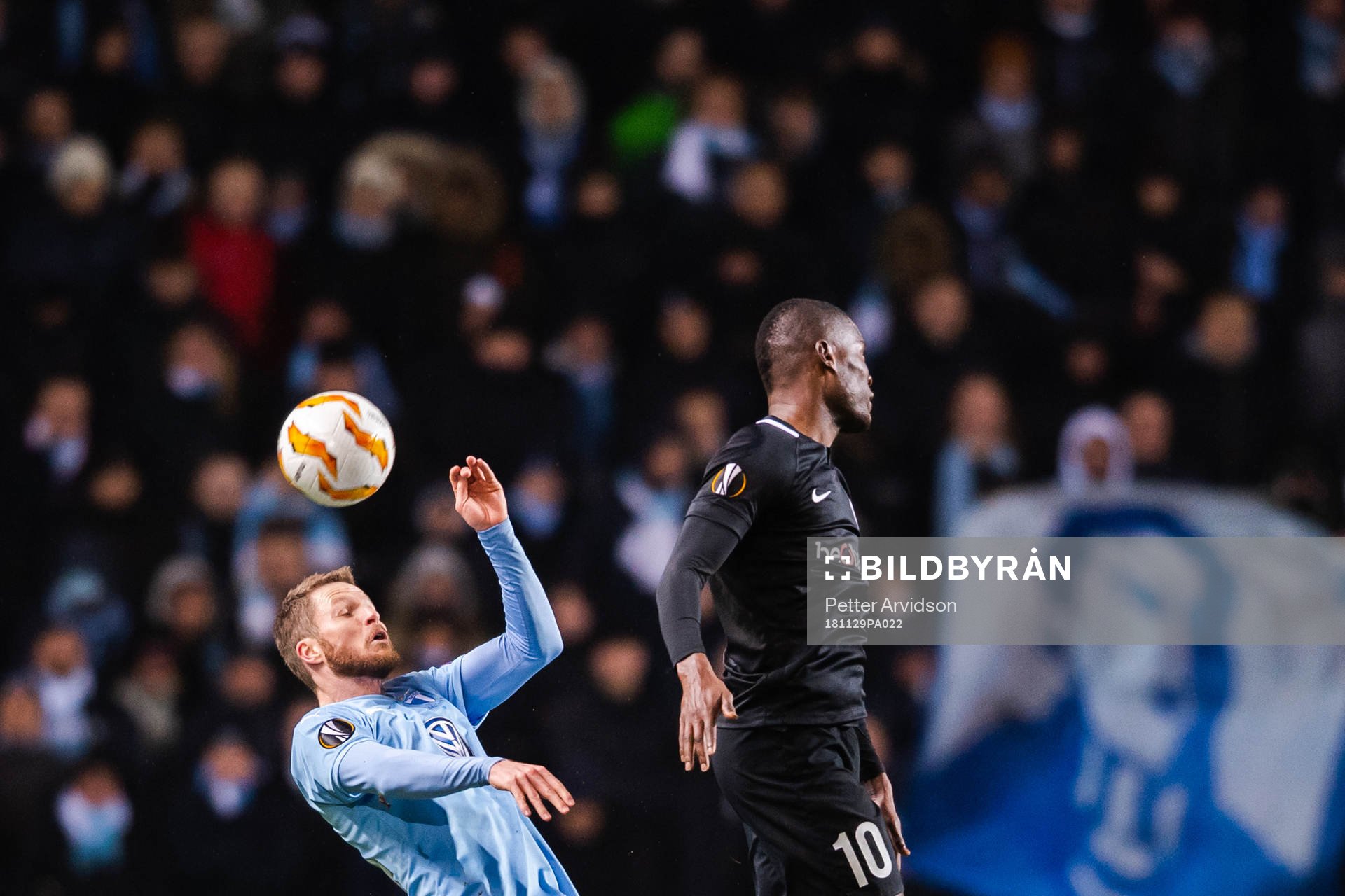 Lasse Nielsen of Malmö FF and Mbwana Samatta of Genk