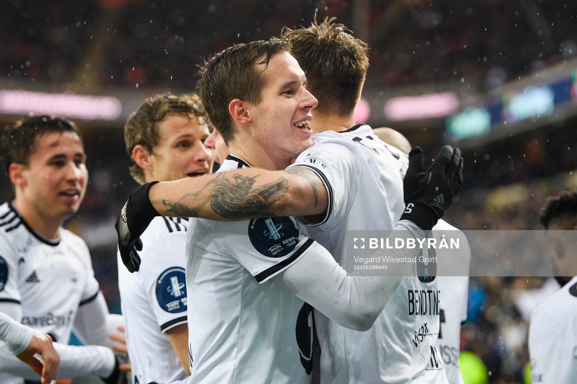 Nicklas Bendtner of Rosenborg celebrates with teammate