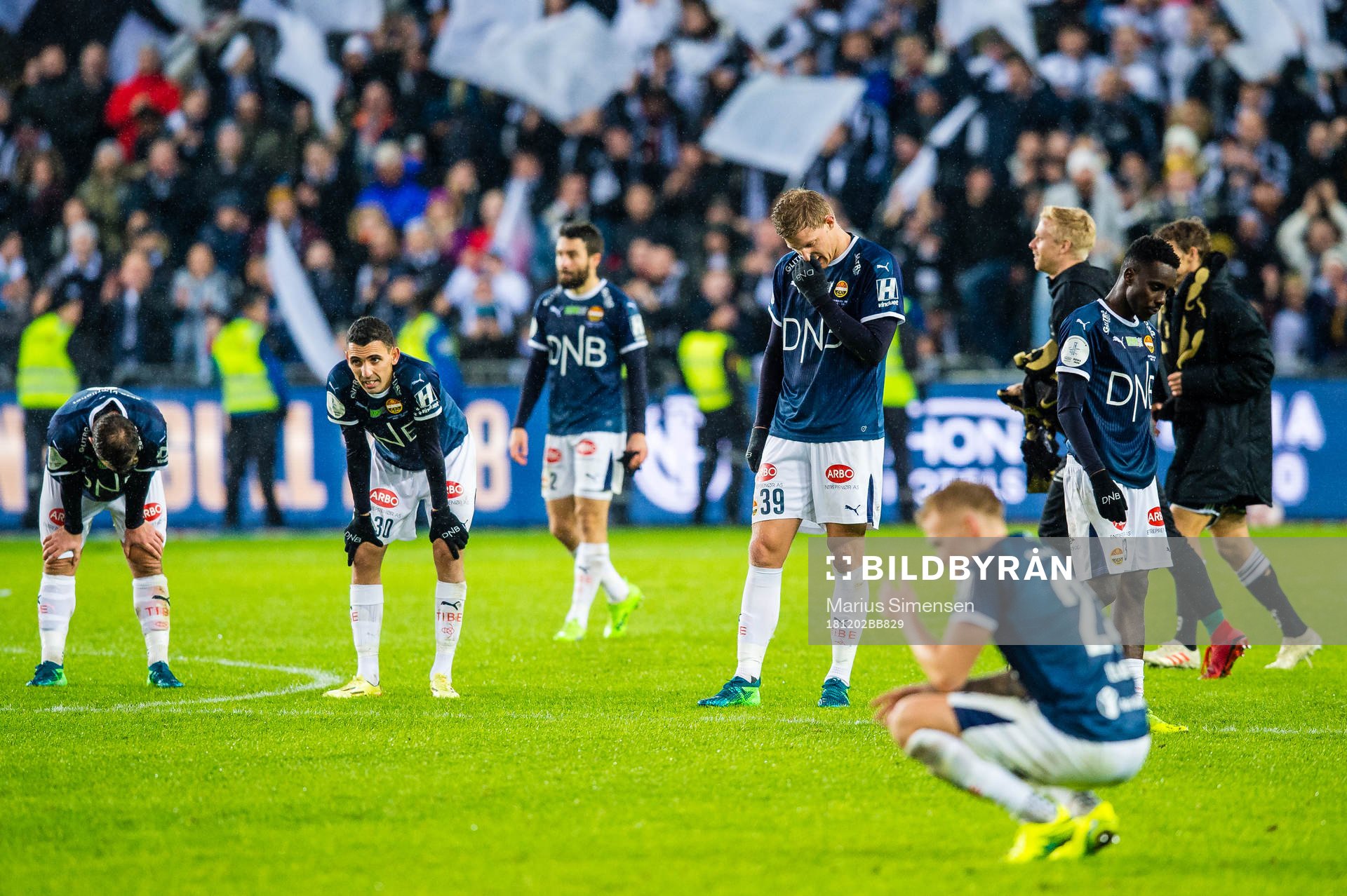 Henning Hauger, Mustafa Abdellaoue, Lars Sætra and Tokmac Nguen of Strømsgodset looks dejected after the cup final match between Rosenborg and Strømsgodset on December 2, 2018 in Oslo.