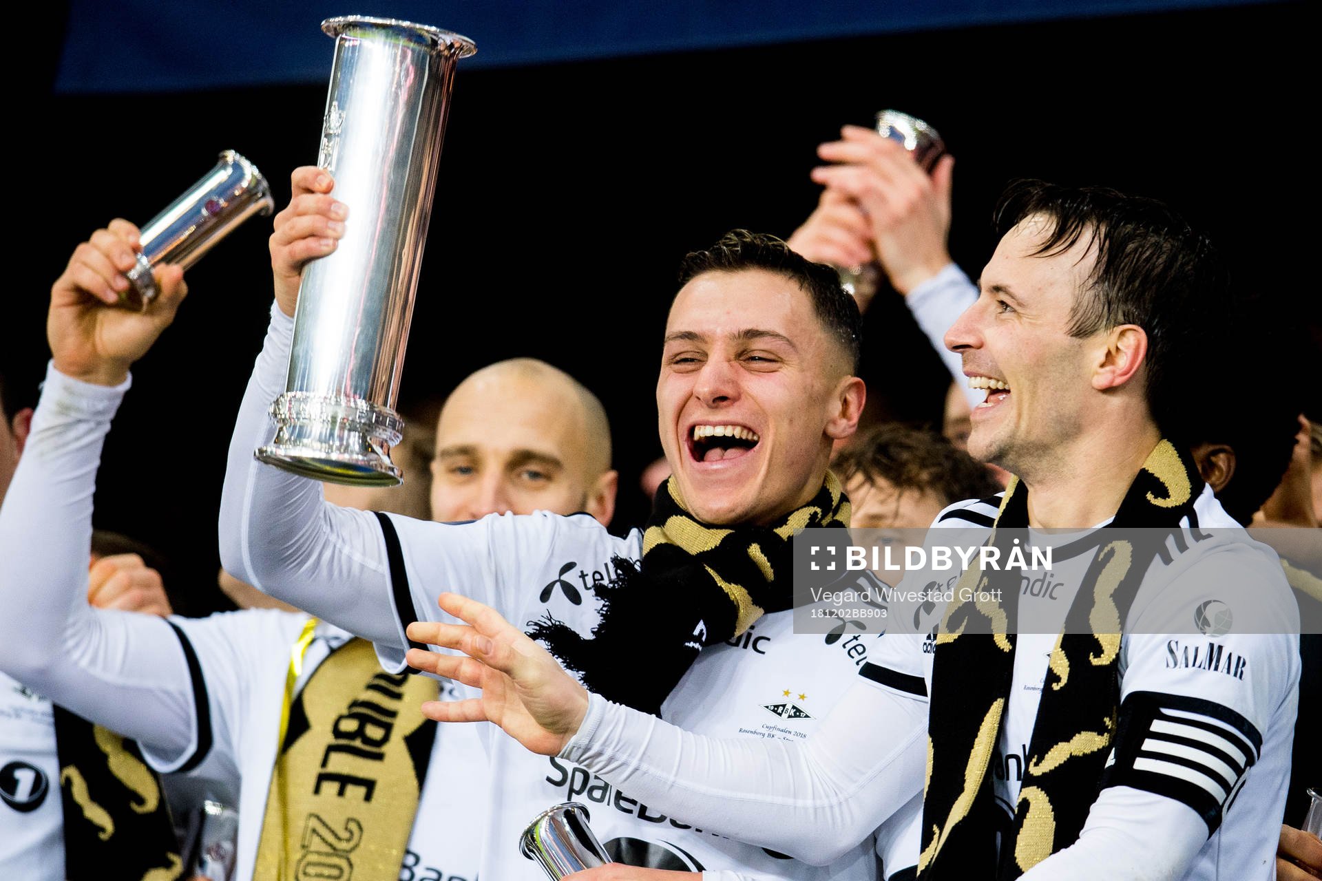 Jonathan Levi of Rosenborg lifts the trophy with teammate Mike Jensen after winning the cup final between Rosenborg and Strømsgodset on December 2, 2018 in Oslo.