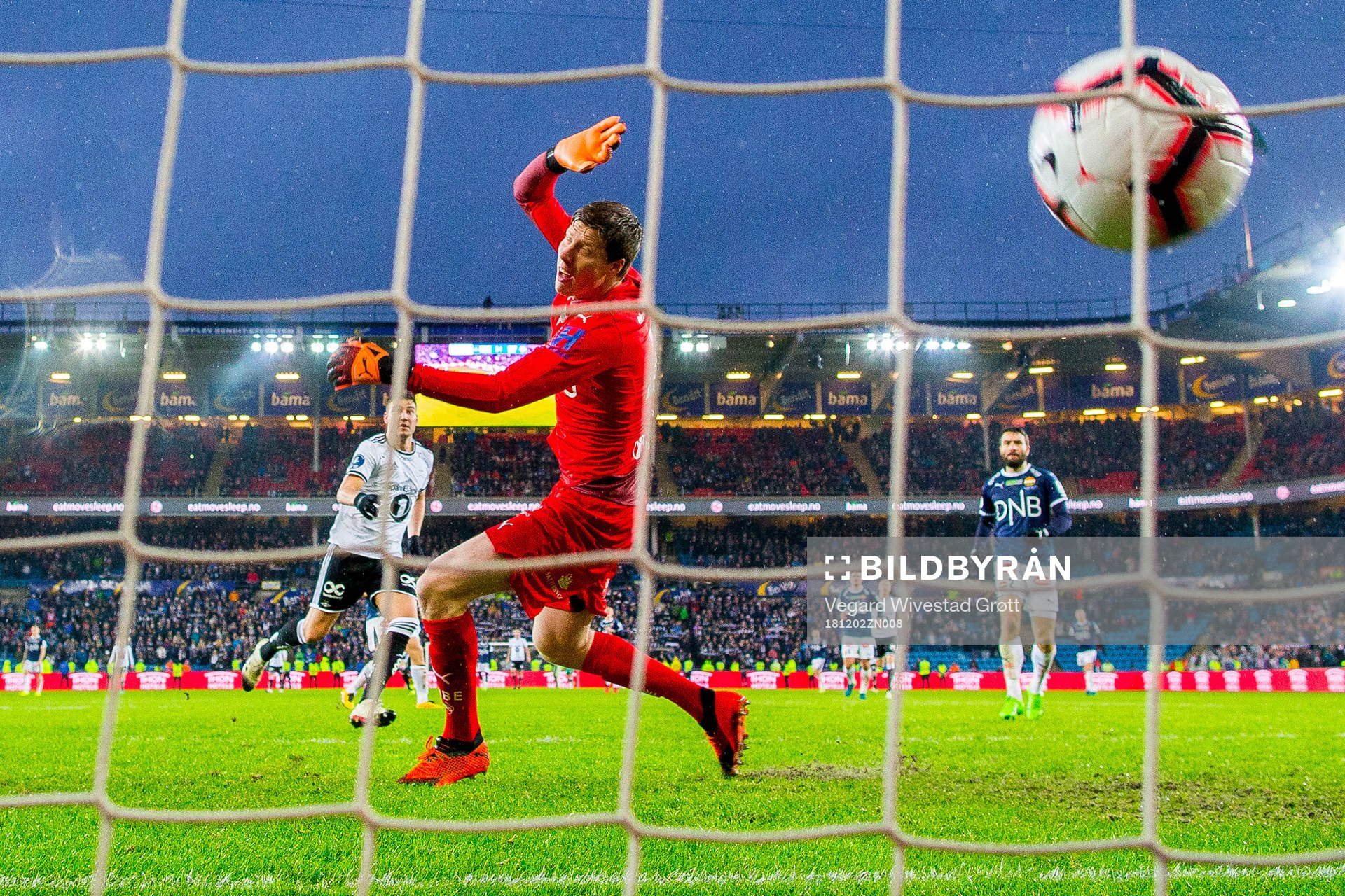 Nicklas Bendtner of Rosenborg scores 4-1 behind goalkeeper