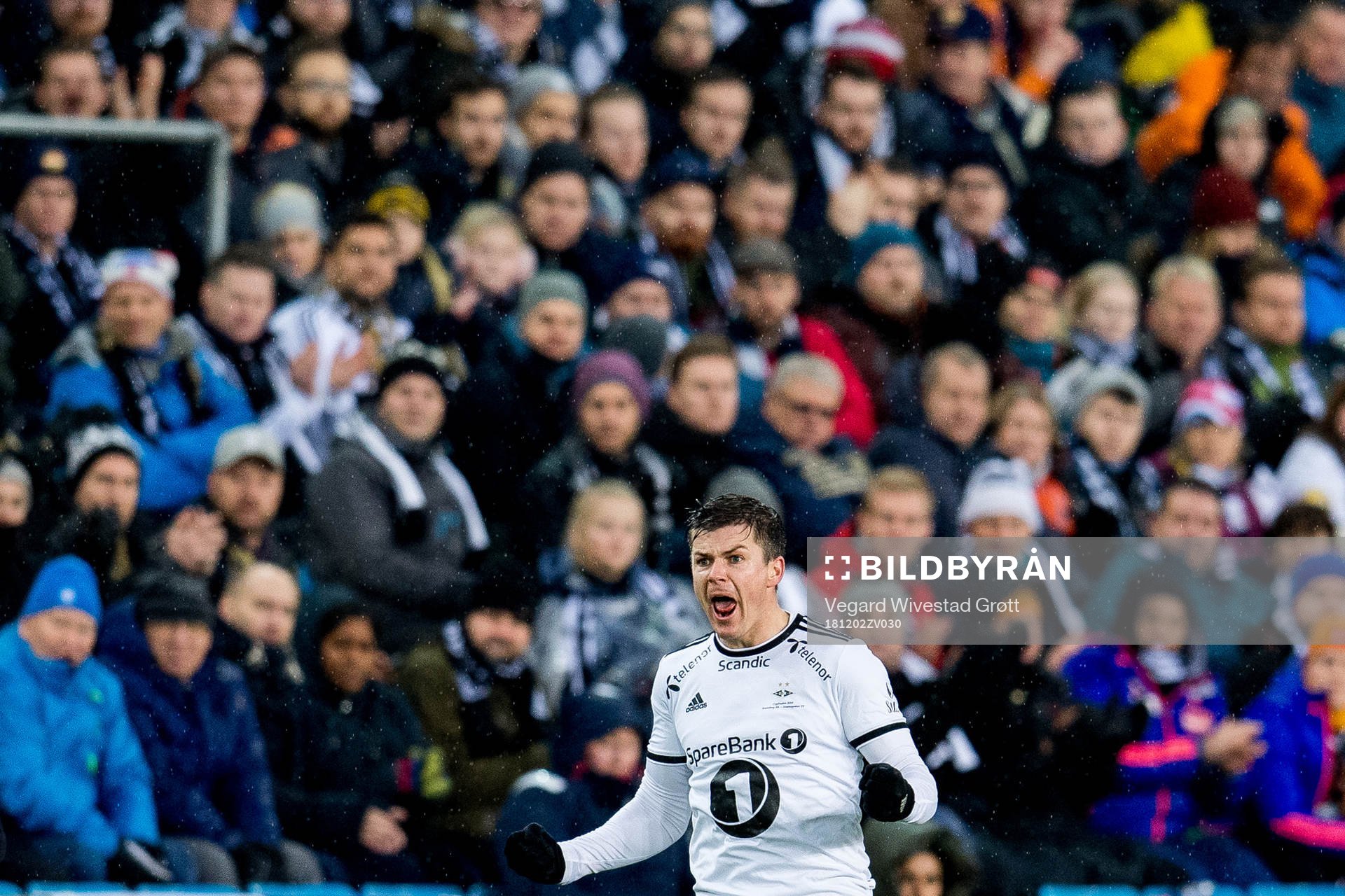 Pål André Helland of Rosenborg celebrates while being