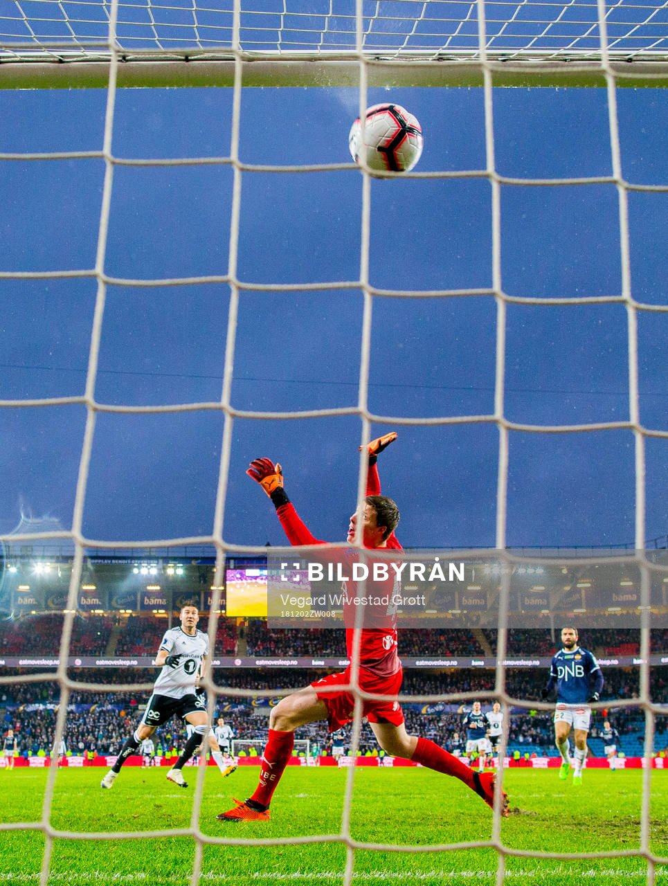 Nicklas Bendtner of Rosenborg scores 4-1 behind goalkeeper