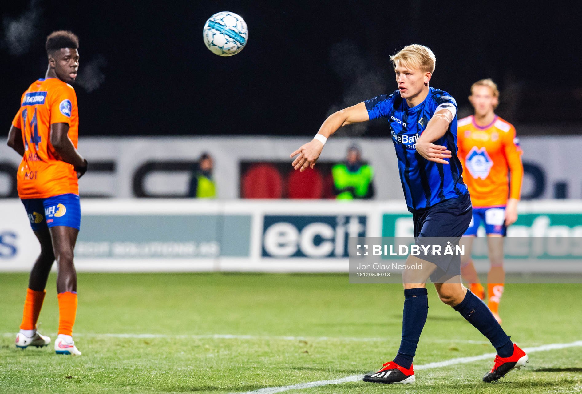 Jørgen Hatlehol of Aalesund watches Andreas Hanche-Olsen