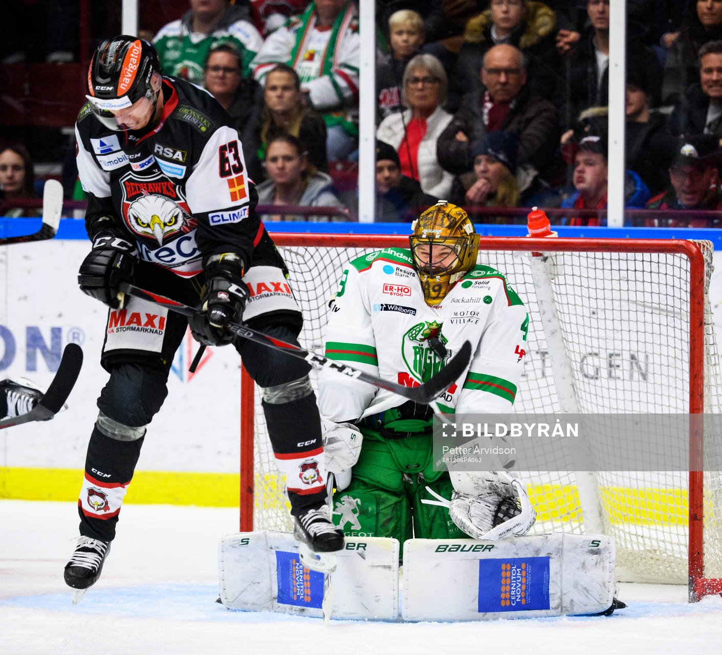 Malmö Redhawks Fredrik Händemark och Rögles målvakt
