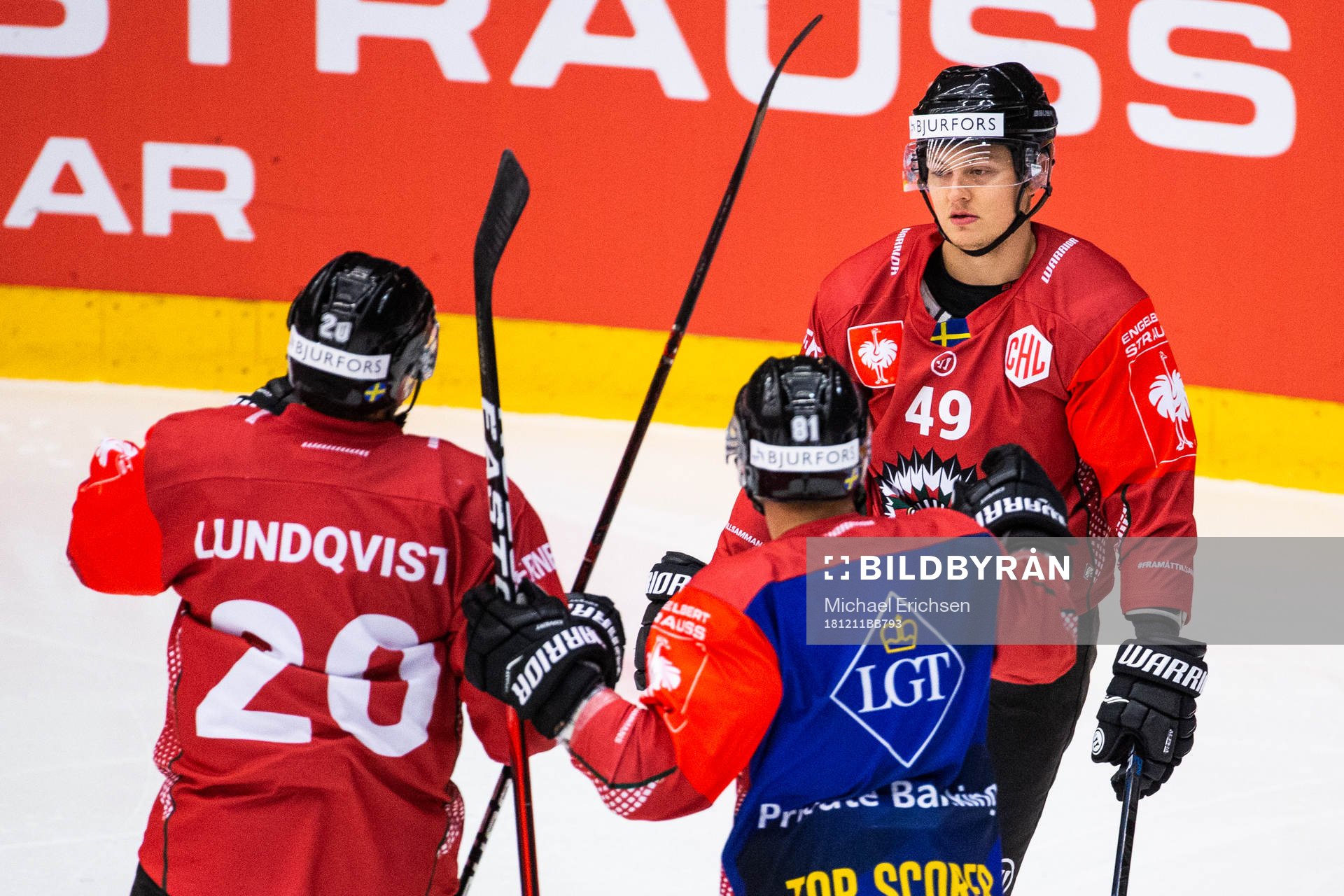 Joel Lundqvist and Ryan Lasch celebrate with Rhett Rakshani