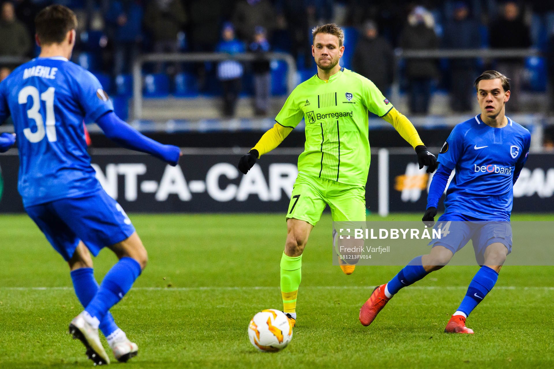 Joakim Maehle and Leandro Trossard of Genk and Ole Jørgen
