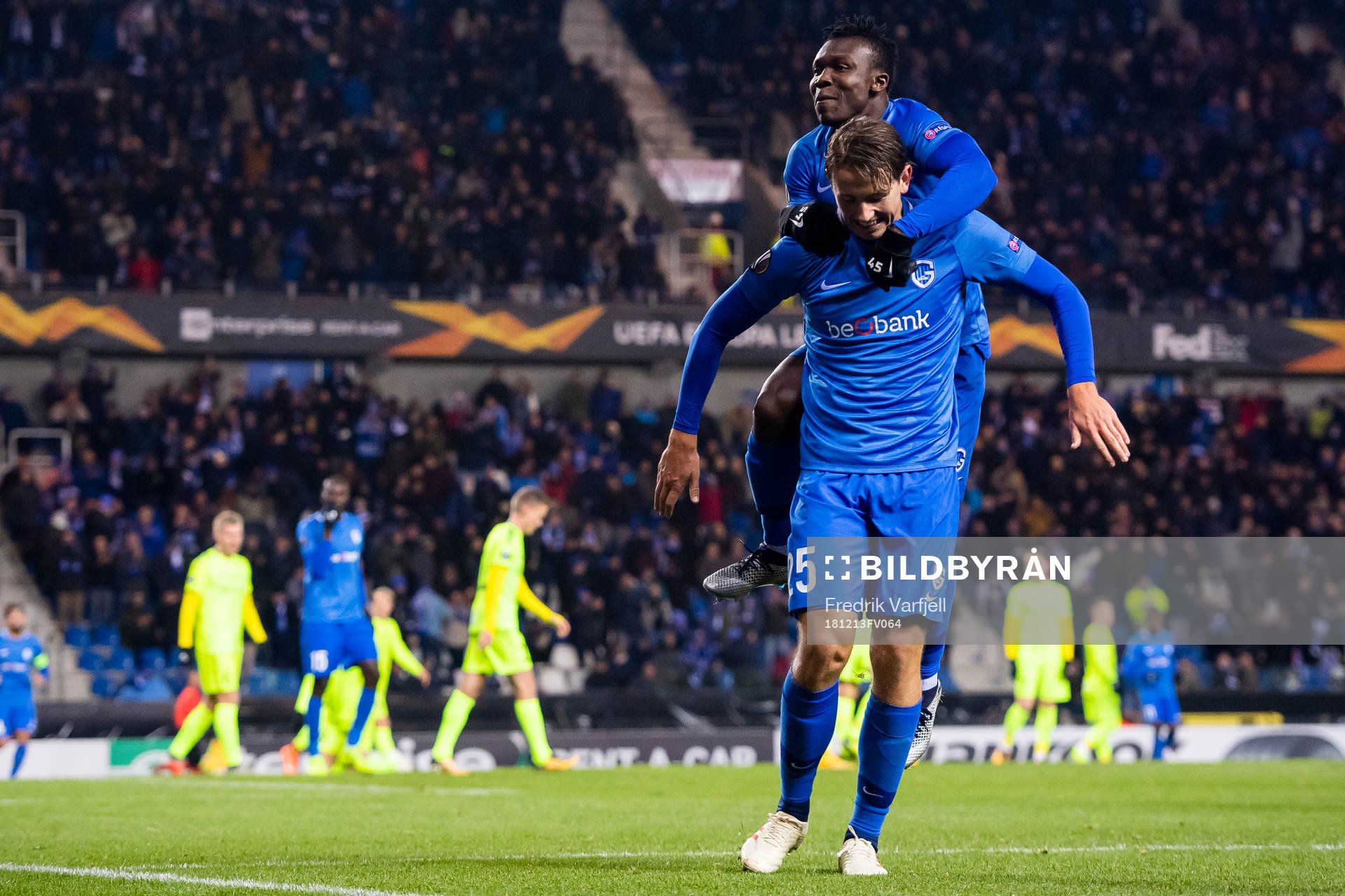 Sander Berge of Genk celebrates with his teammate Joseph Aidoo after scoring 3-0 during the Europa League group stage match between Genk and Sarpsborg 08 on December 13, 2018 in Genk.