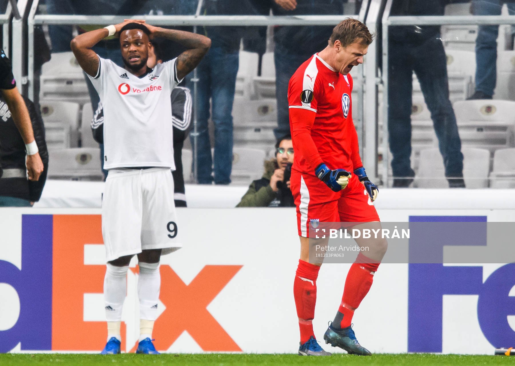 Cyle Larin of Besiktas looks dejected and goalkeeper Johan