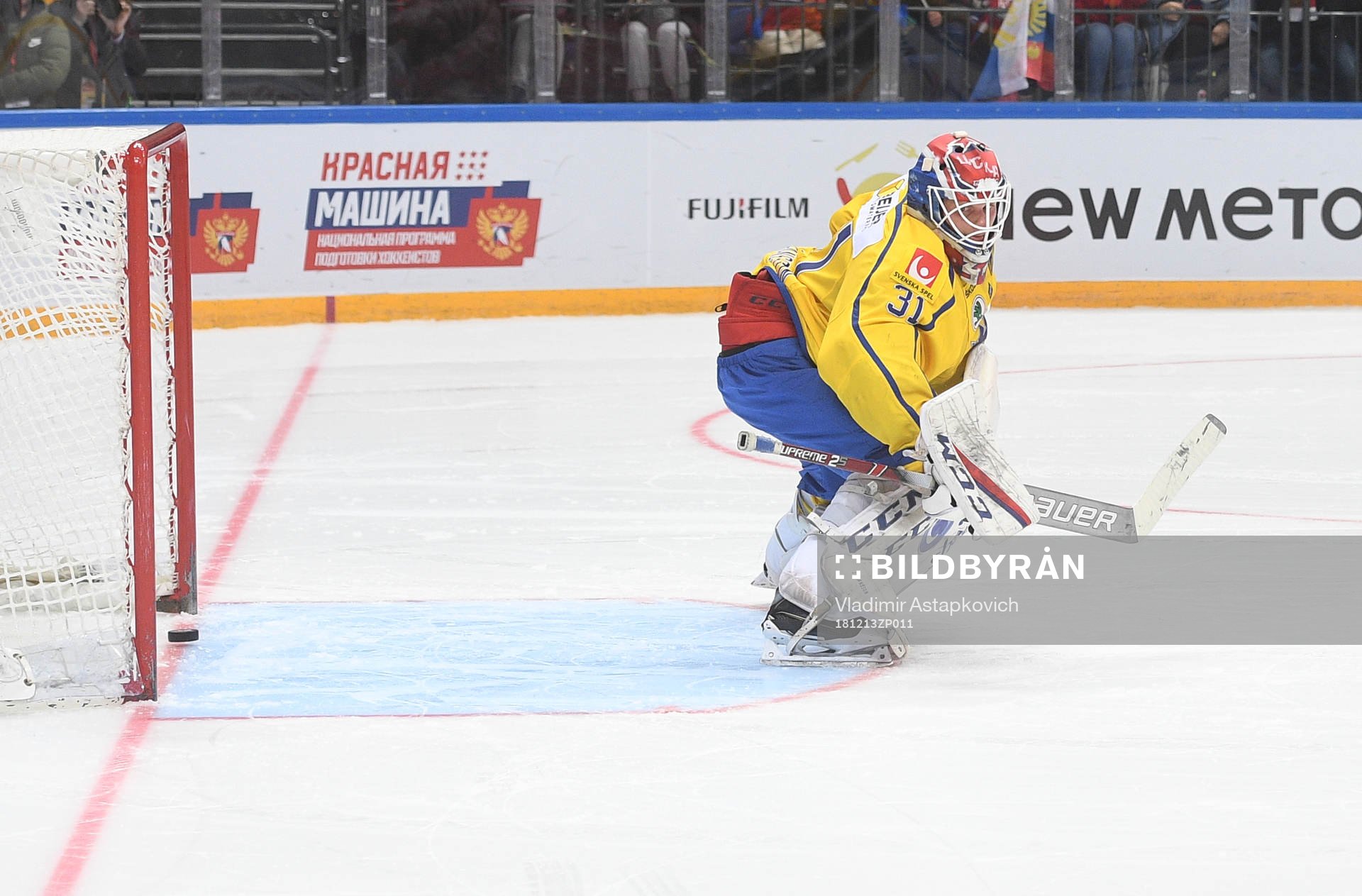 Sweden's goalie Lars Johansson misses a shot by Russia's
