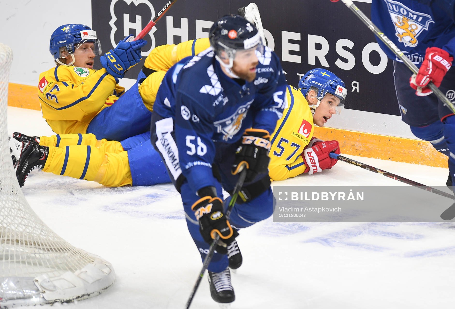 Sweden's John Norman, left, and Anton Wedin fall