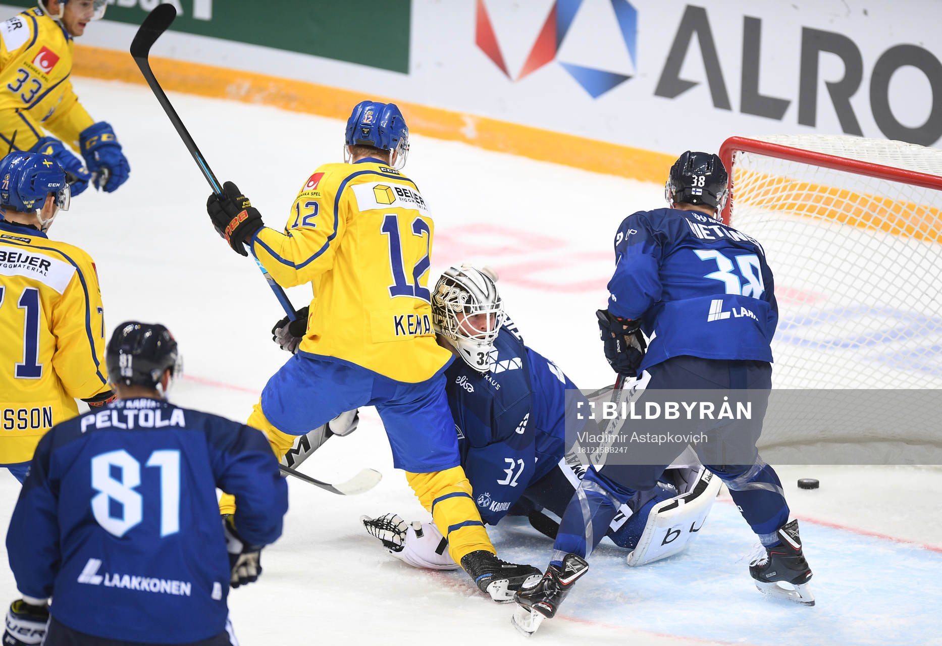 Sweden´s Joel Kellman sees the the puck go in behind