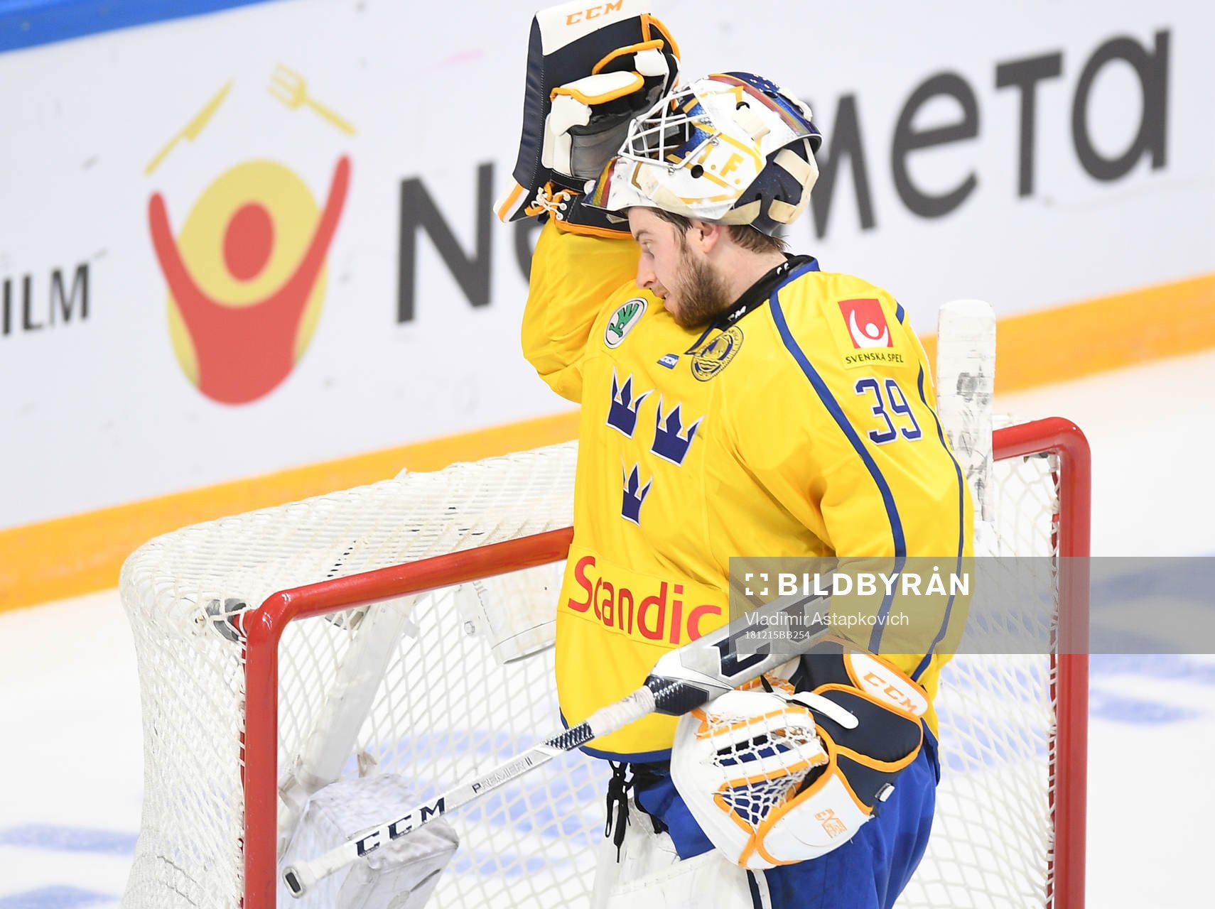 Sweden's goalie Adam Reideborn reacts