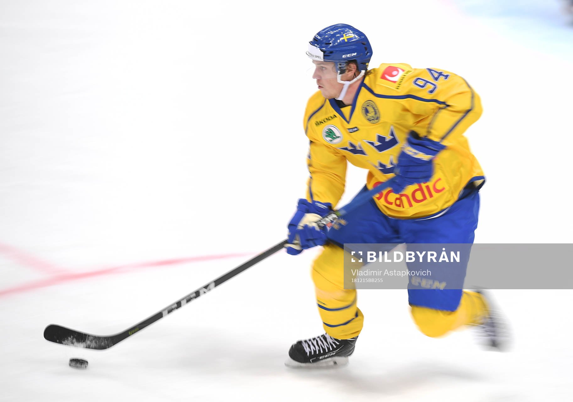 Sweden's Joel Persson controls a puck