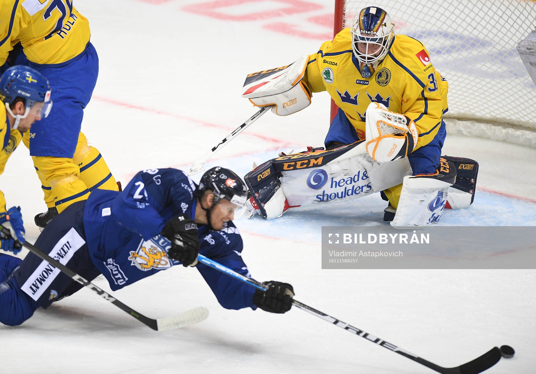 Sweden's goalie Adam Reideborn watches as Finland's Jani
