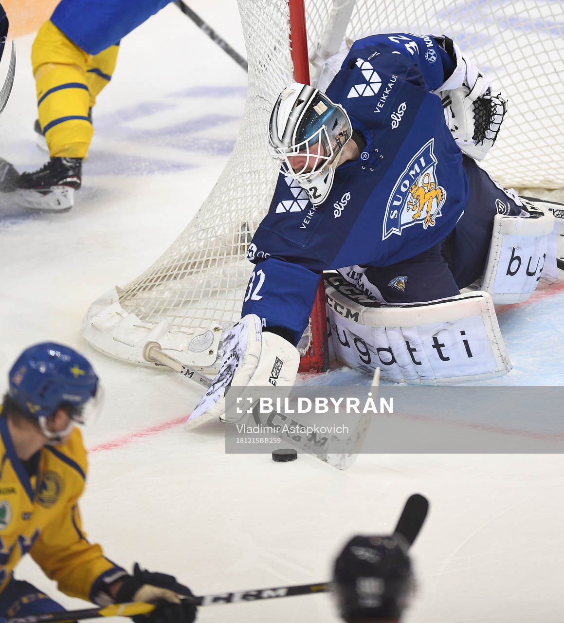 Finland's goalie Rasmus Tirronen makes a save