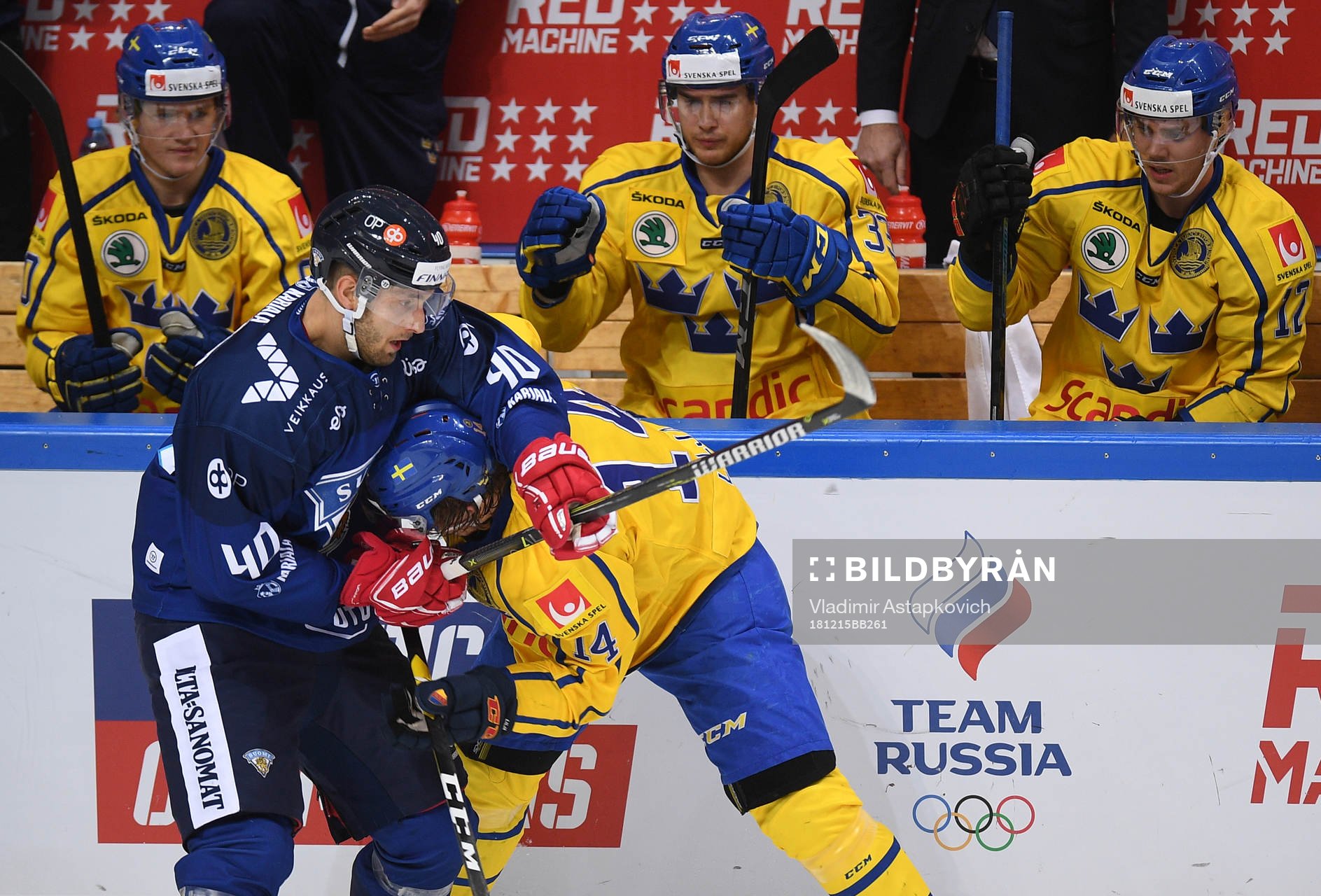 Finland's Petteri Lindbohm, left, holds Sweden's Jakob Lilja