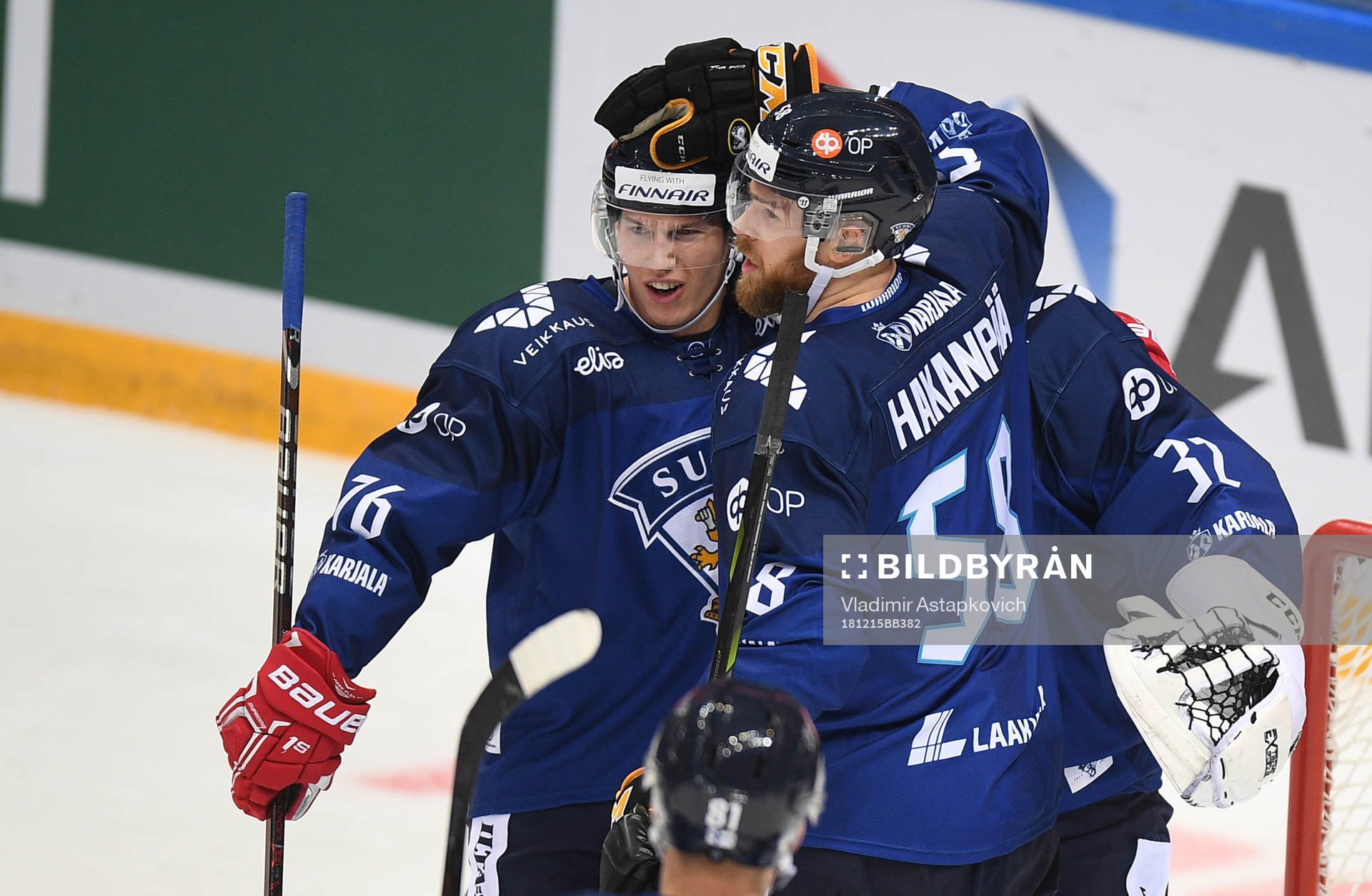 Finland's players celebrate the team's 3-2 victory at the