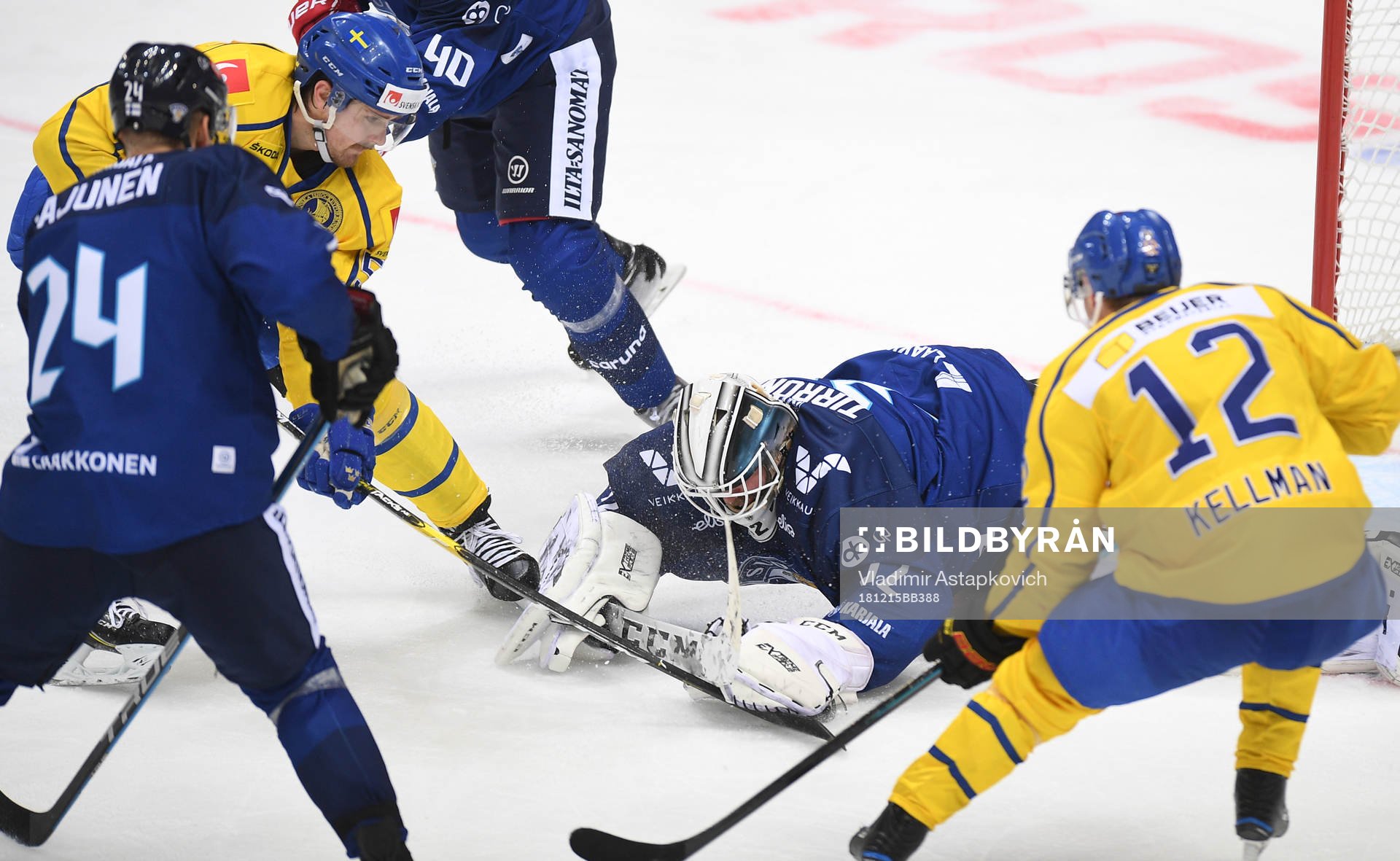 Finland's goalie Rasmus Tirronen makes a save