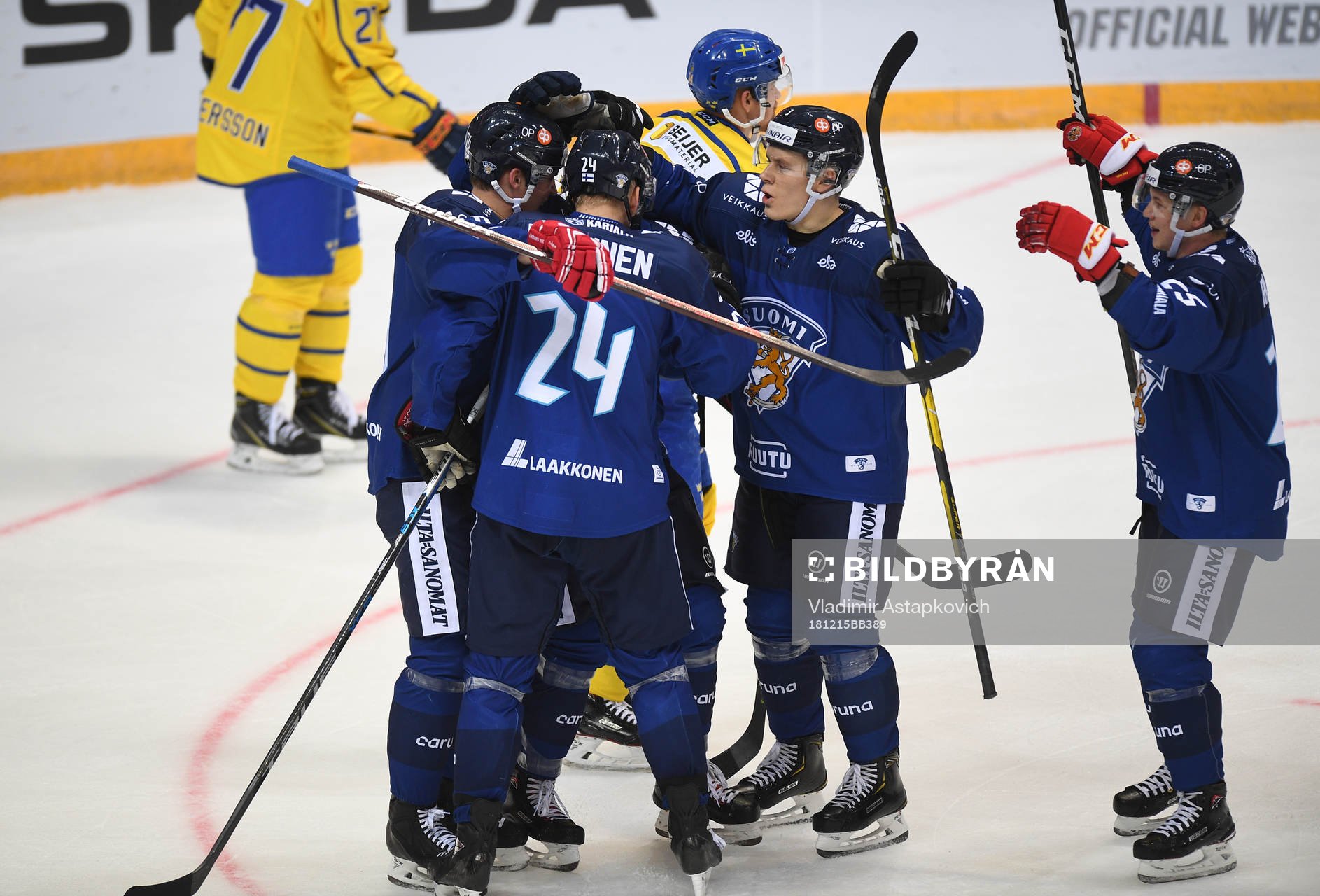 Finland's players celebrate his team's third goal