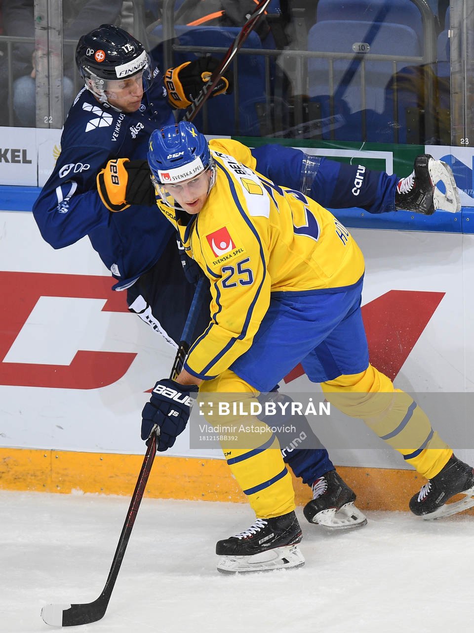 Sweden's Philip Holm, right, boards Finland's Eetu