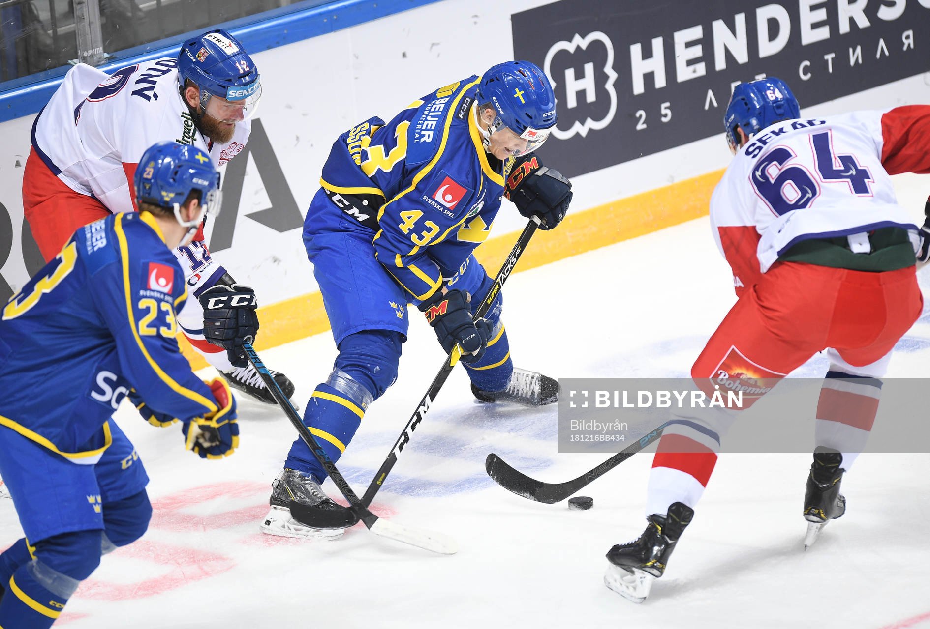 Sweden's Tom Nilsson controls a puck