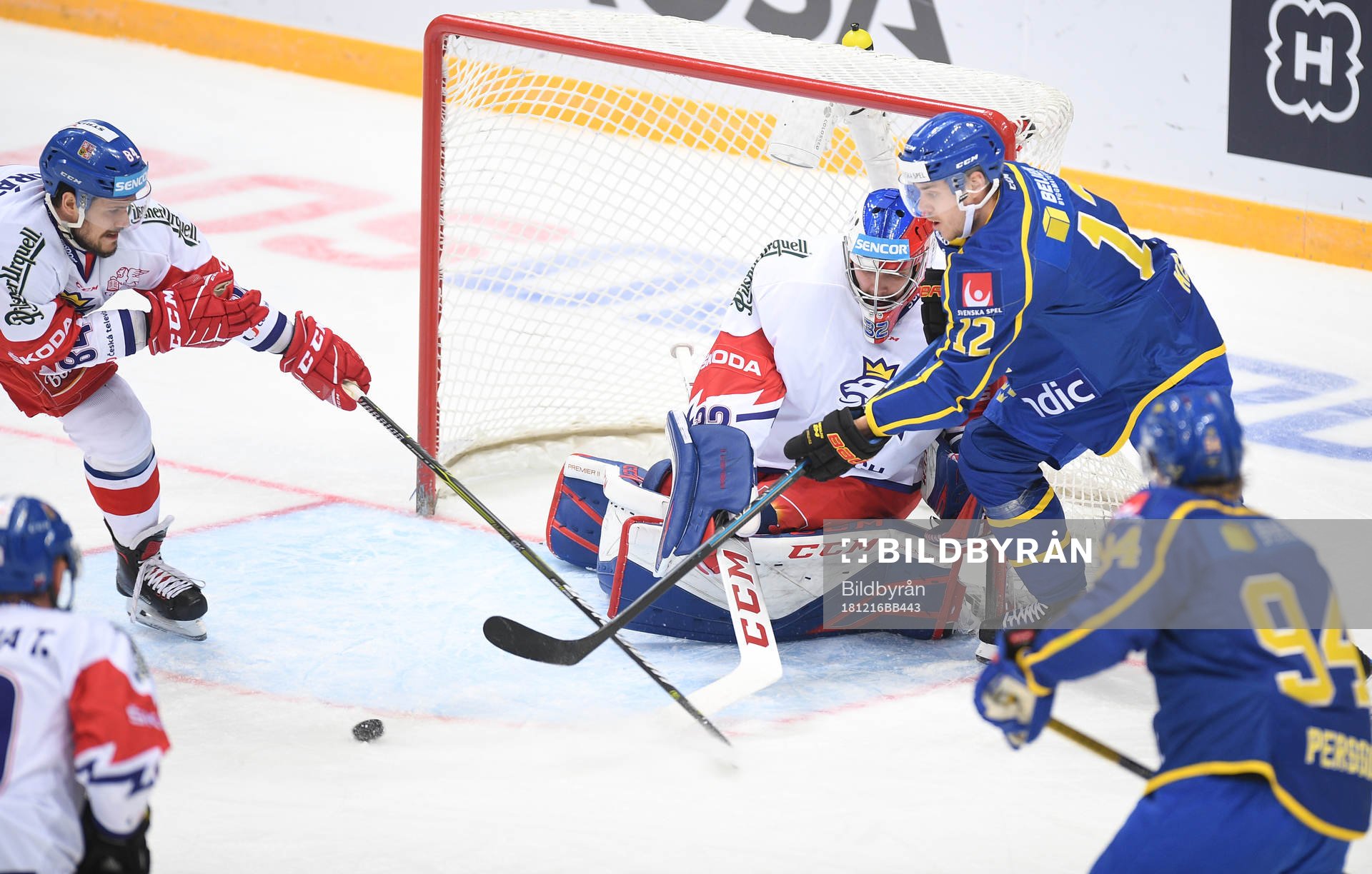Sweden's Joel Kellman, top right, tries to score past Czech