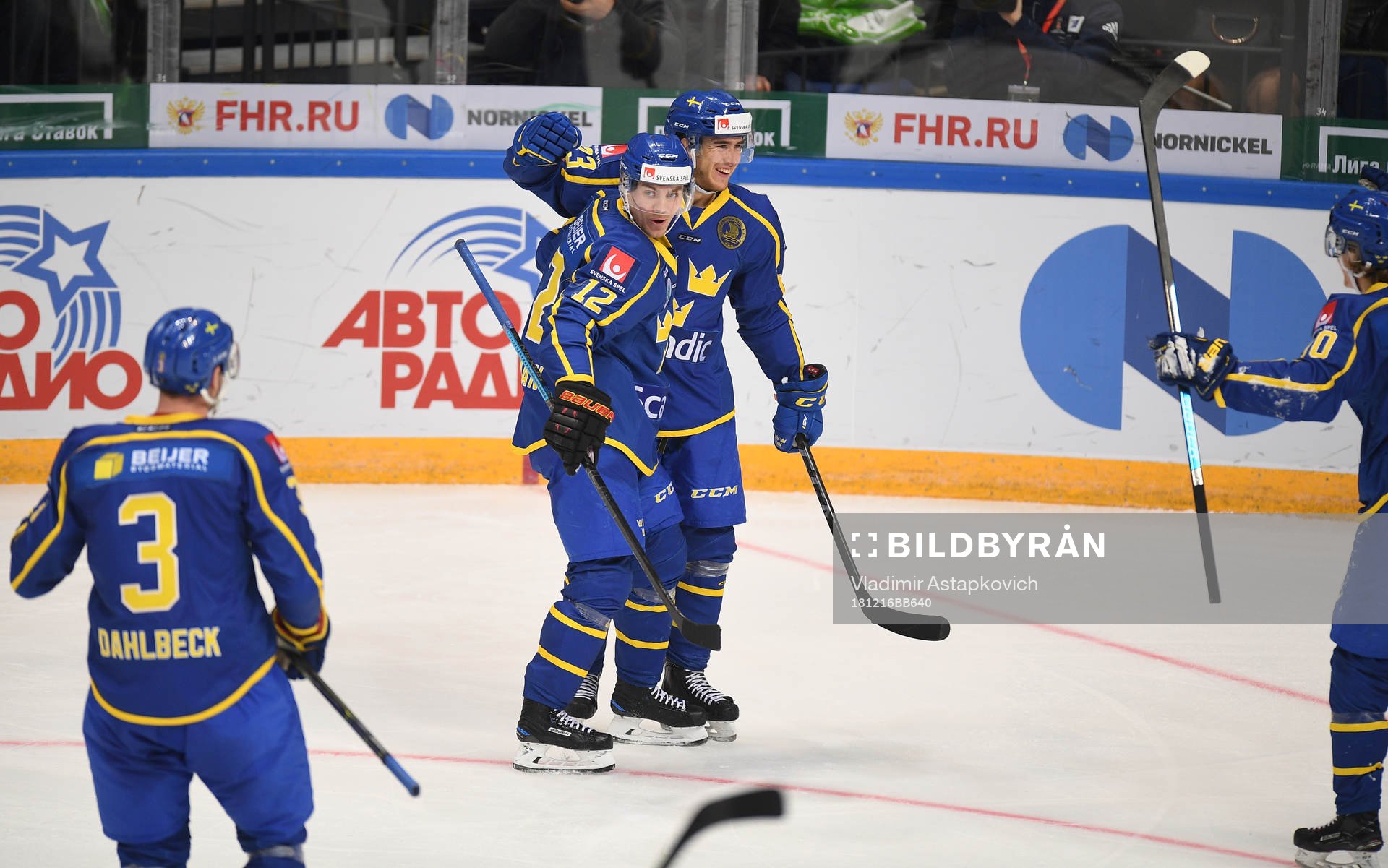 Sweden's Michael Lindqvist, centre right, celebrates his