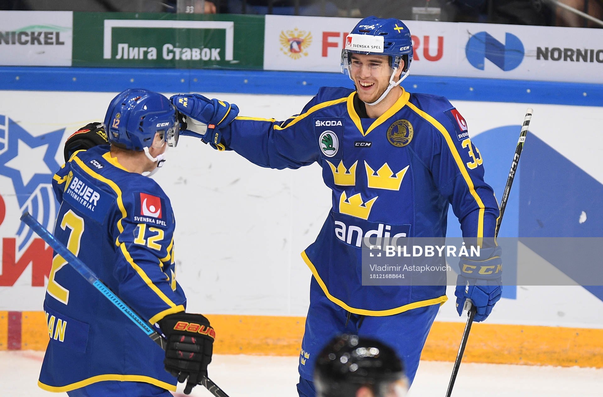 Sweden's Michael Lindqvist, right, celebrates his goal with
