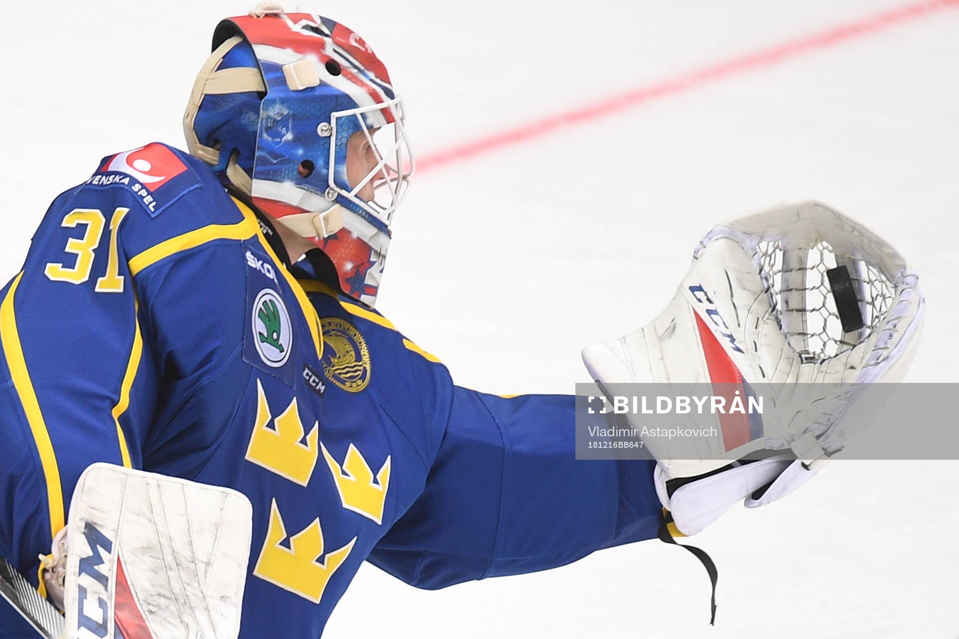 Sweden's goalie Lars Johansson makes a save