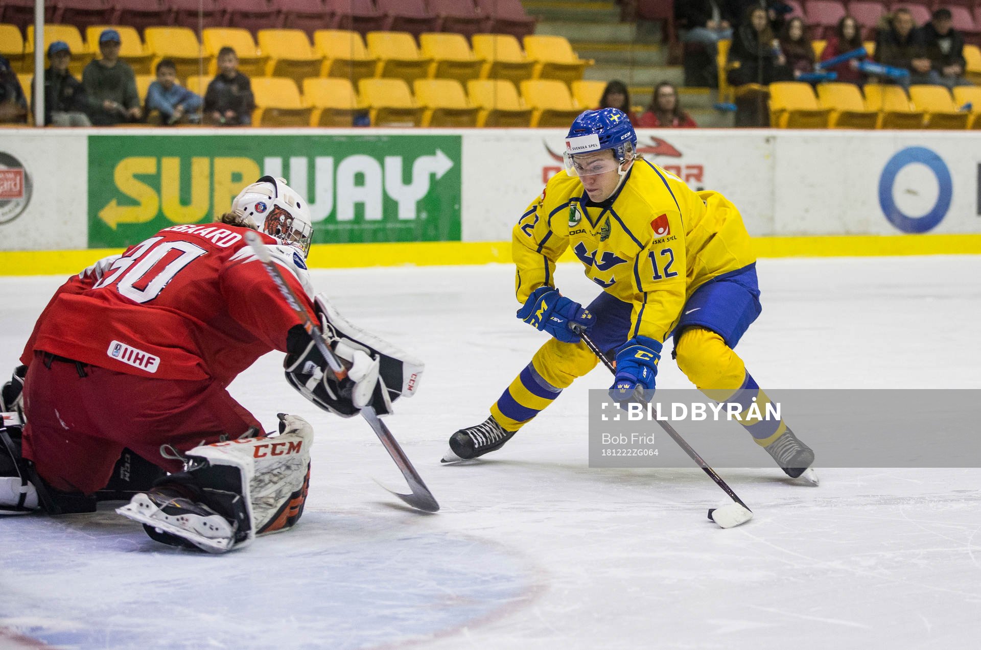 Sweden defenceman Erik Brännström (12) shoots