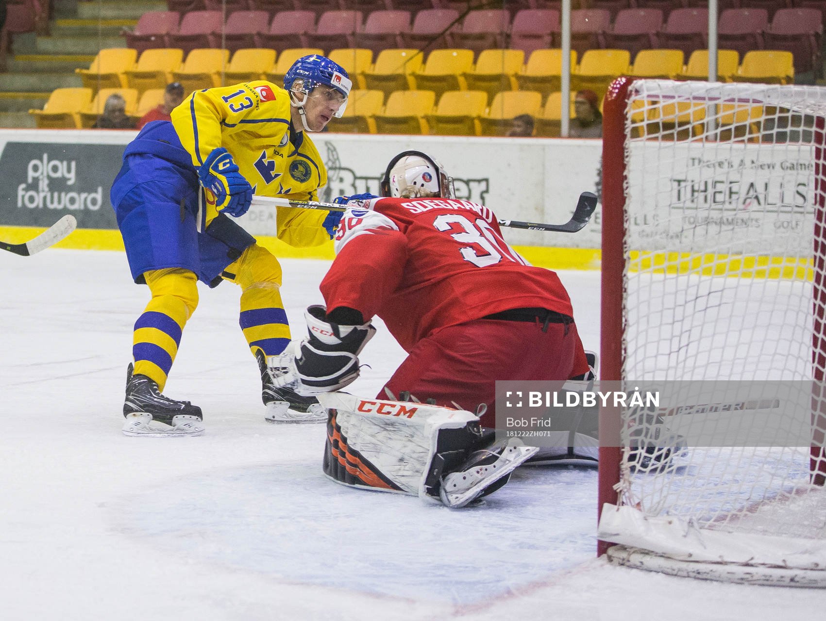 Sweden forward Johan Södergran (13) scores Denmark goalie