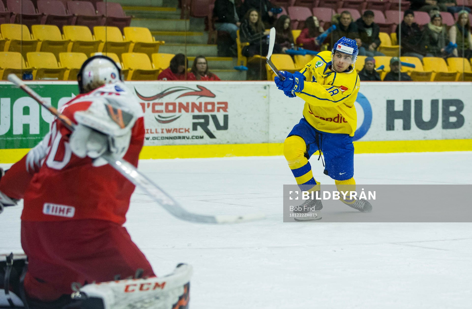 Sweden forward Jacob Olofsson (18)  scores in  overtime
