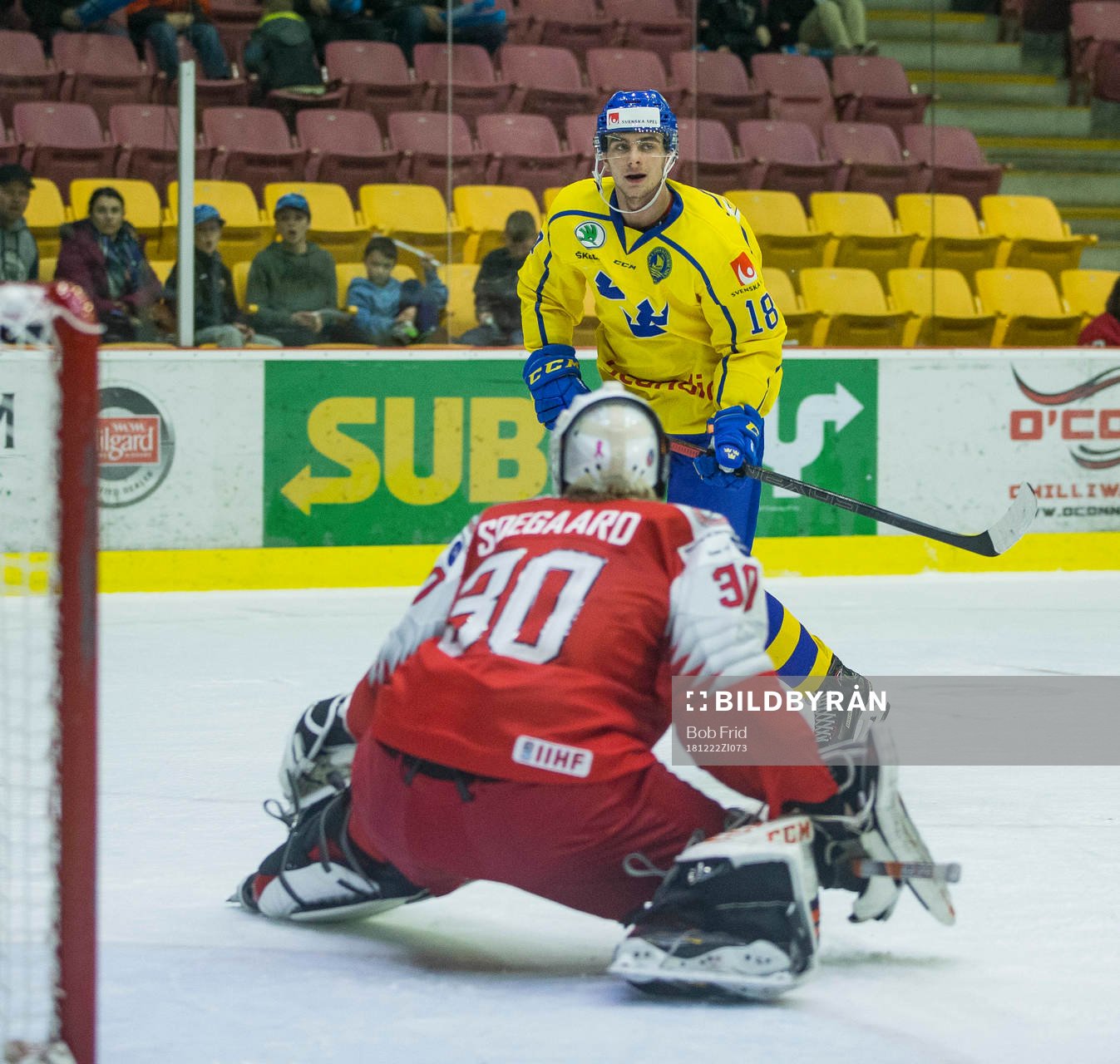 Sweden forward Jacob Olofsson (18)  scores in  overtime