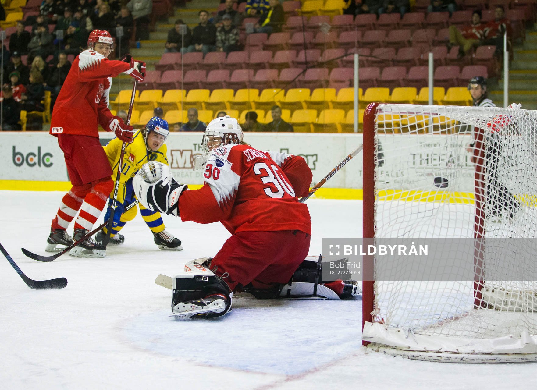 Denmark defenceman Malte Setkov (3) and Sweden forward