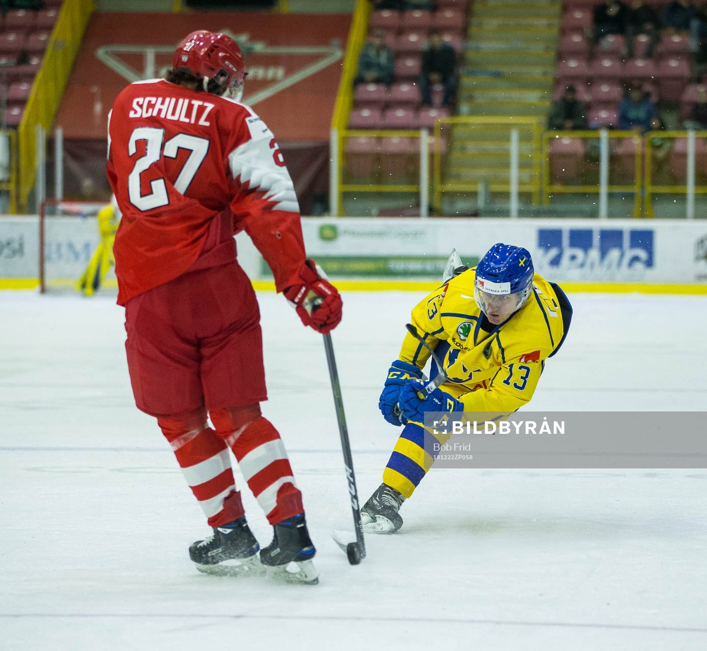 Sweden forward Johan Södergran (13)  shoots past Denmark