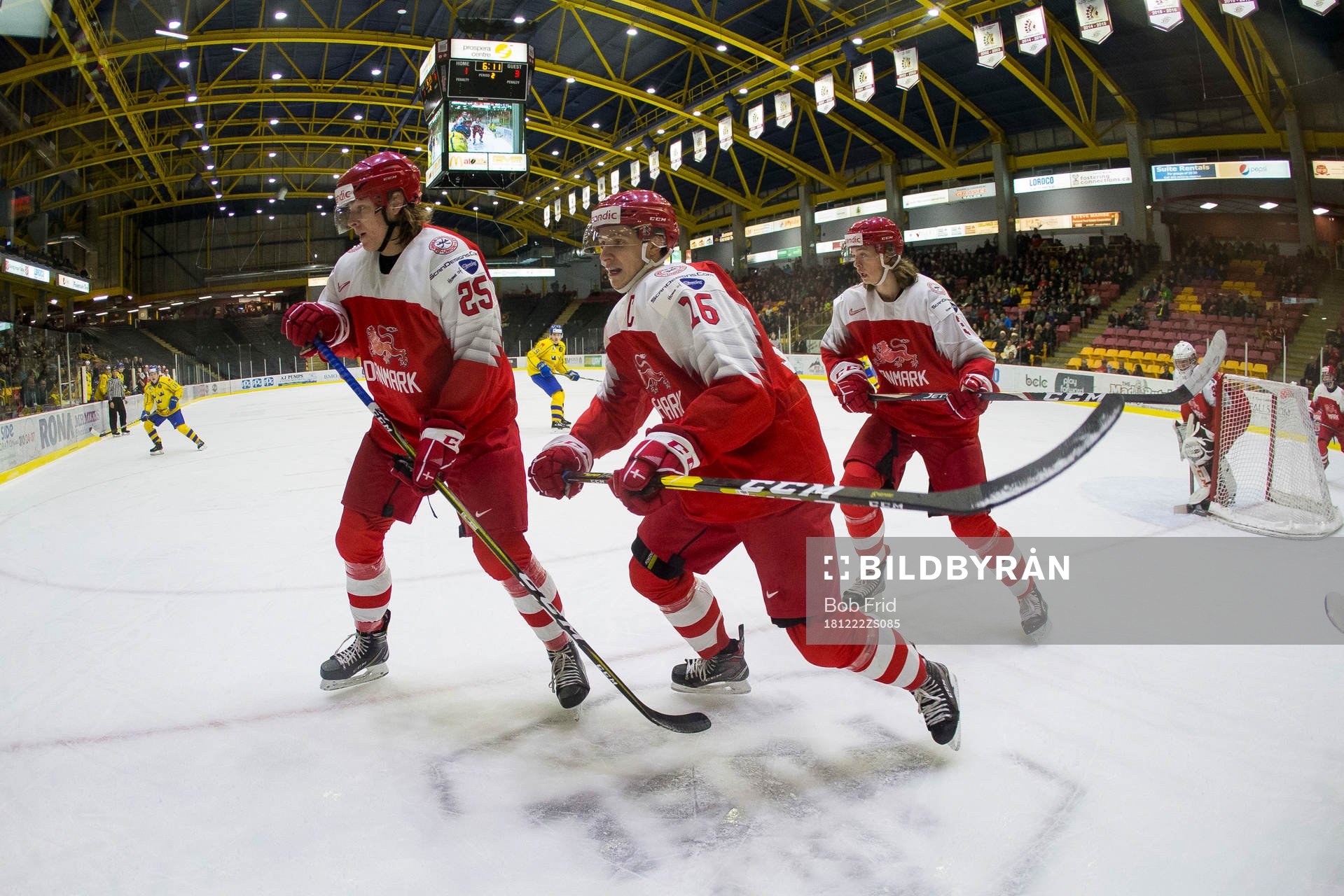 Denmark defenceman Oscar Schulze (25)  and forward Jonas