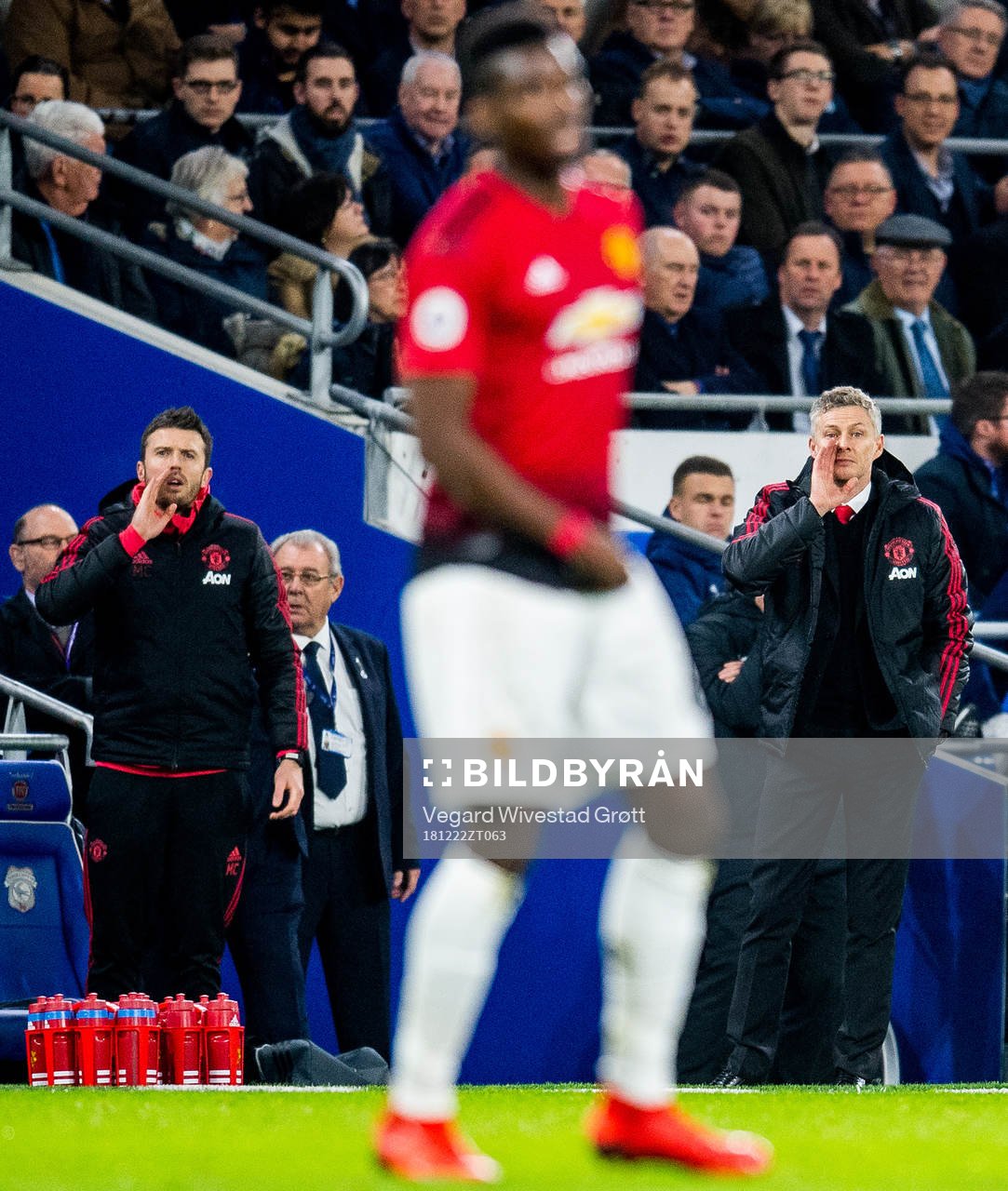 Michael Carrick and Ole Gunnar Solskjær, manager of Manchester United, shout towards Paul Pogba during the Premier League match between Cardiff and Manchester United on December 22, 2018 in Cardiff.