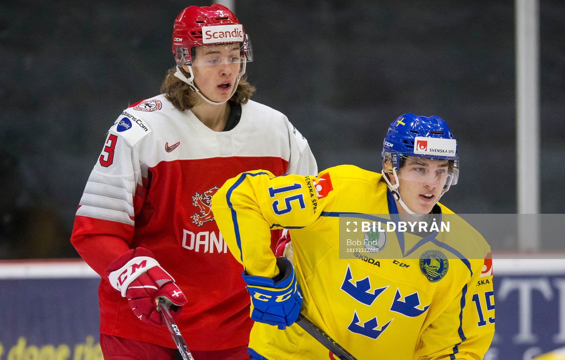 Denmark defenceman Malte Setkov (3)  battles with Sweden