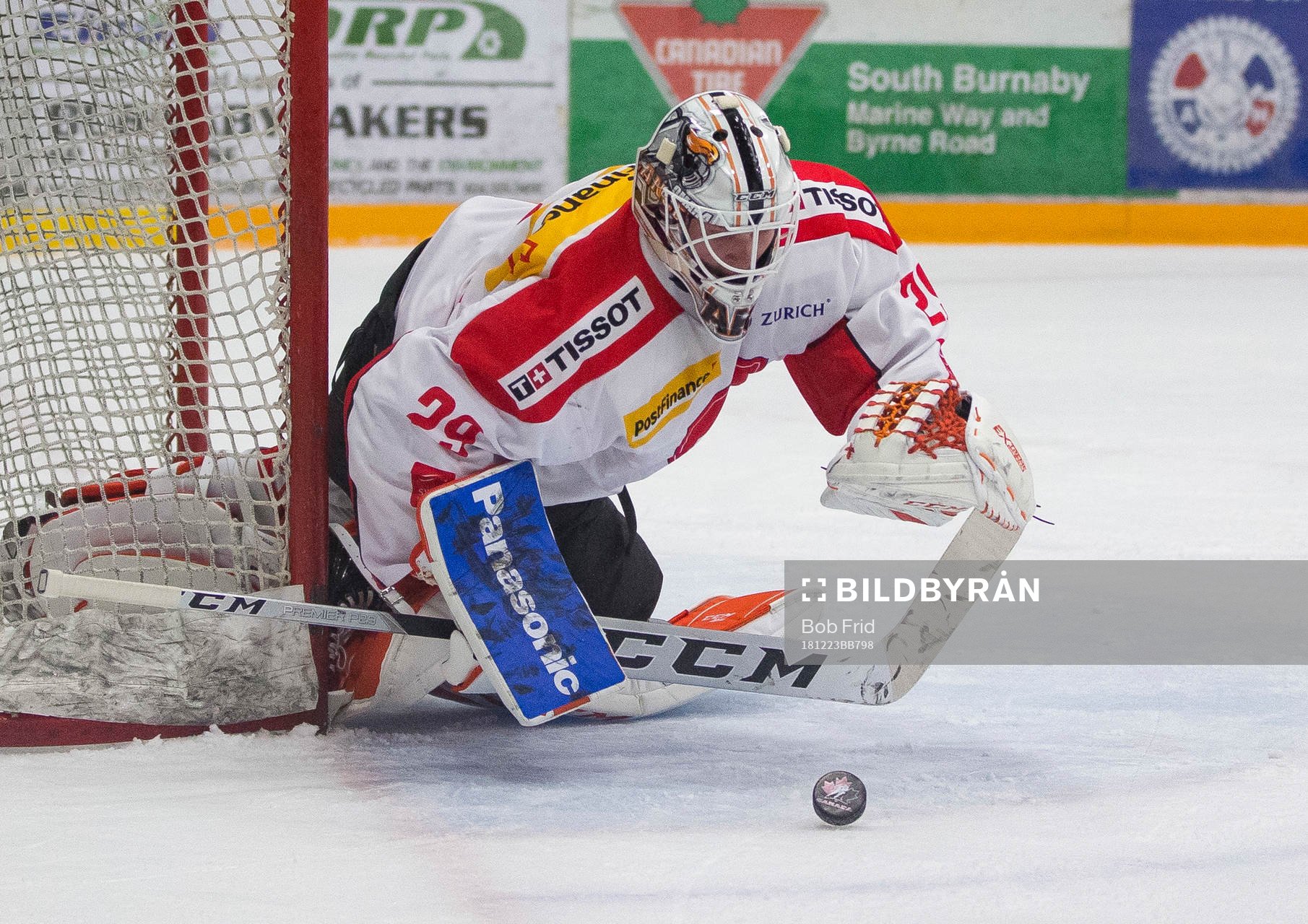 Switzerland goalie Akira Schmid (29)  makes a save against