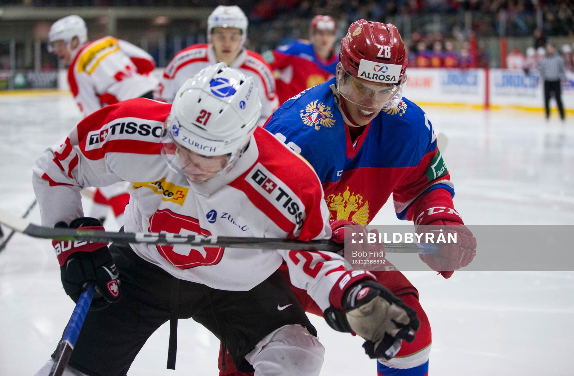 Russia forward Grigory Denisenko (28)  checks Switzerland