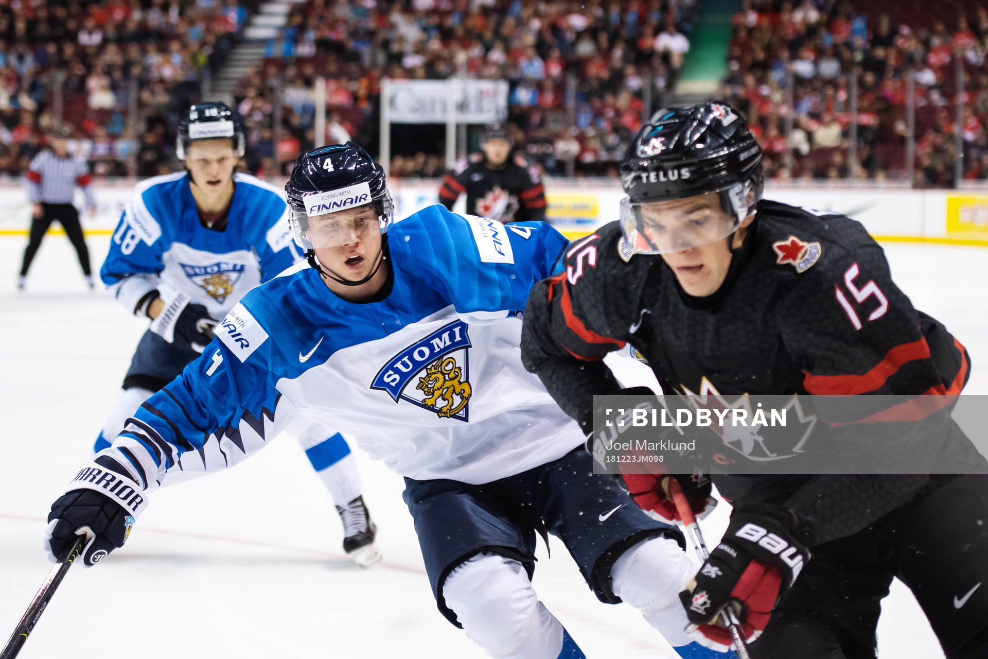 Aleksi Anttalainen of Finland and Shane Bowers of Canada