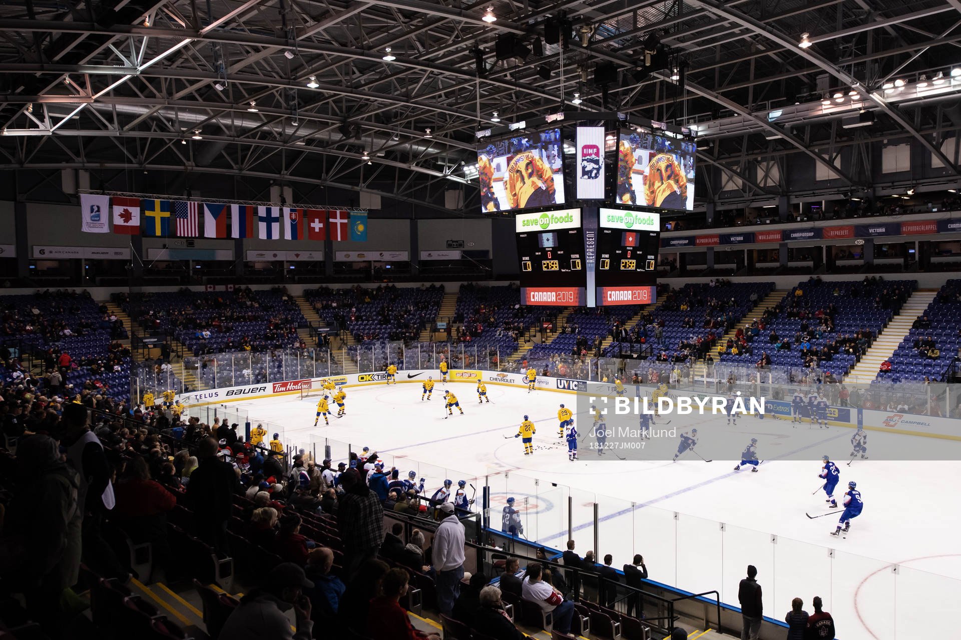 Players of Sweden and Slovakia warm up
