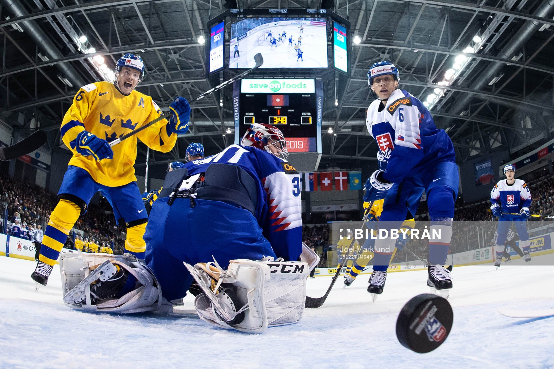 Rickard Hugg of Sweden celebrate the 1-2 goal from Lucas